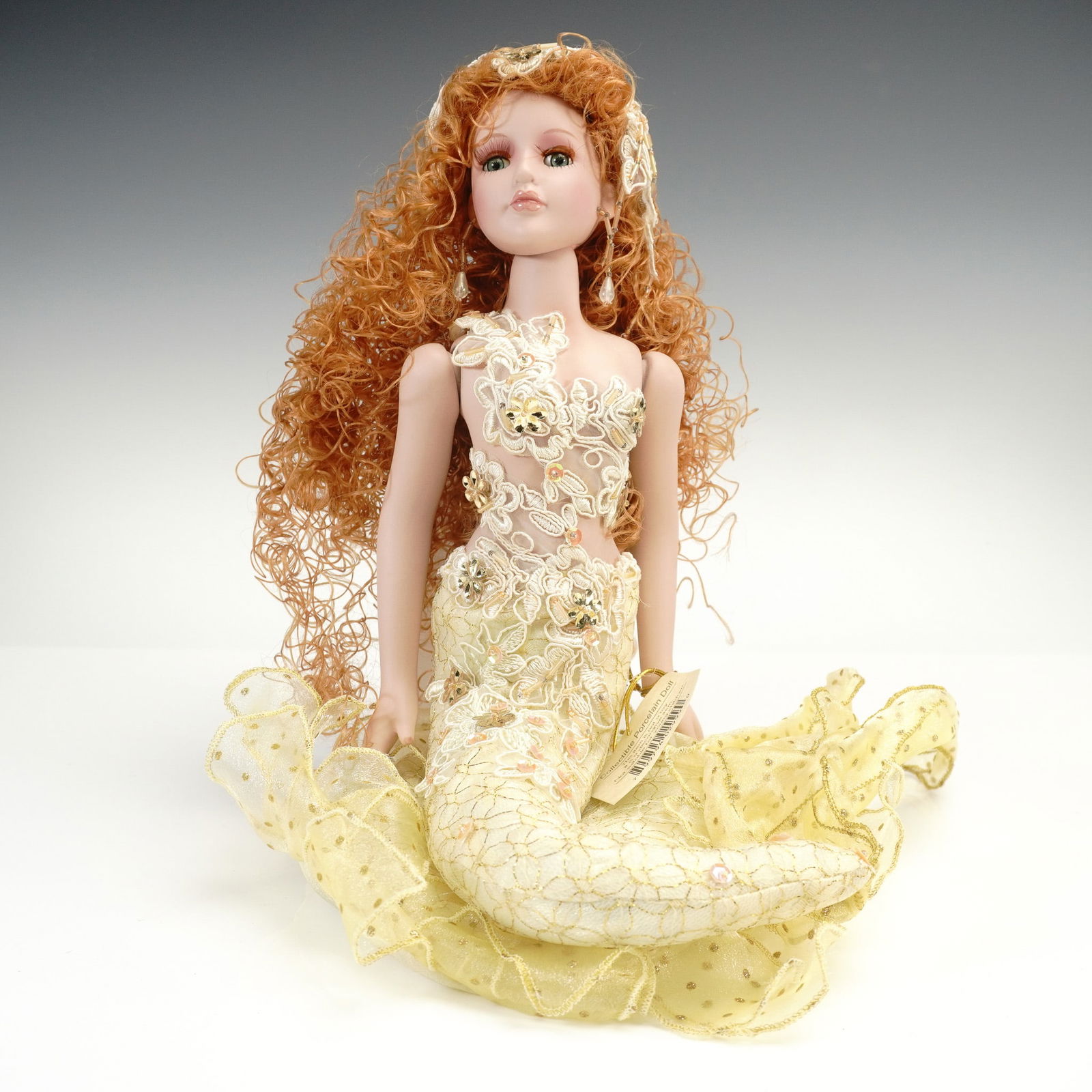 Show-Stoppers Inc Porcelain Doll, Sea Treasure Mermaid: A captivating Show-Stoppers, Inc. porcelain mermaid doll titled Sea Treasure, measuring approximately 12 inches in height. This elegantly crafted collectible features a hand-painted face with lifelike