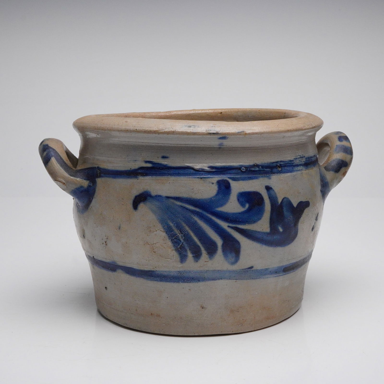 Westerwald Salt Glazed Stoneware Crock with Cobalt Blue Decoration: A single antique Westerwald-style salt-glazed stoneware crock, consistent with the form of a salt-glazed earthenware pot. The utilitarian vessel features a wide mouth, a slightly flared rim, and two