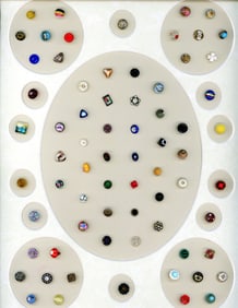 A card of assorted material dimis and smalls