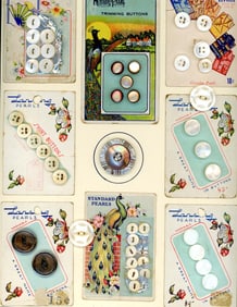 A card of sets of buttons on original store cards