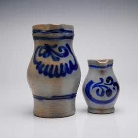 A Pair of German Westerwald Style Salt-Glazed Stoneware Pitchers