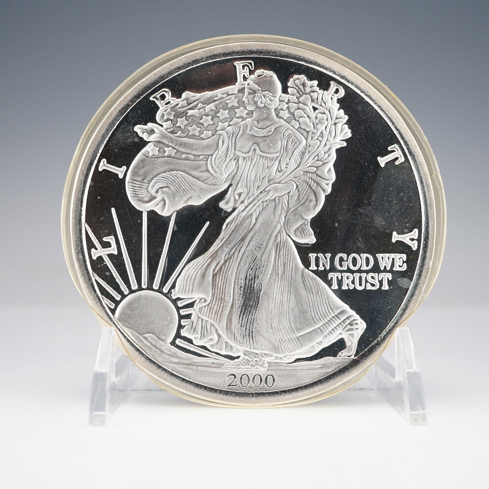 2000 United States Half Troy Pound Fine Silver Round: A substantial commemorative round struck in half a troy pound of fine silver, modeled after the classic Walking Liberty design. The obverse displays the motto IN GOD WE TRUST, surrounded by LIBERTY