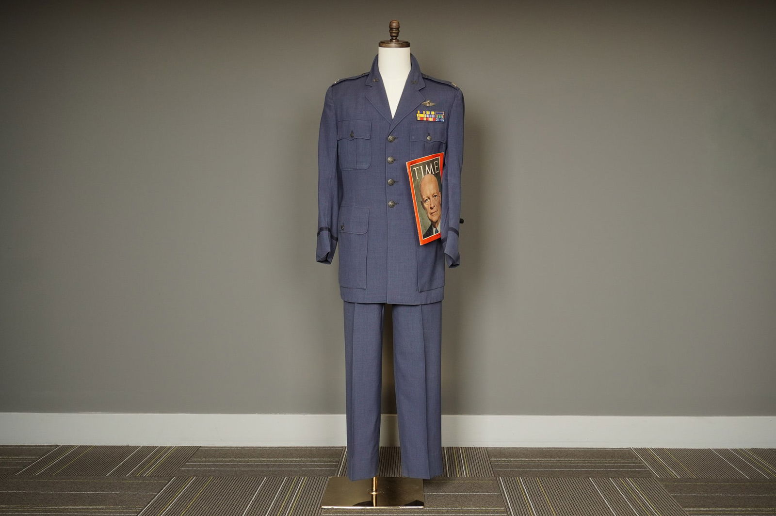 Vintage U.S. Air Force Officer Service Dress Uniform Suit & TIME Magazine: A collection of three components centered around a vintage U.S. Air Force (USAF) Officer Service Dress Uniform, tailored in slate-blue wool gabardine. The uniform consists of a four-pocket jacket and