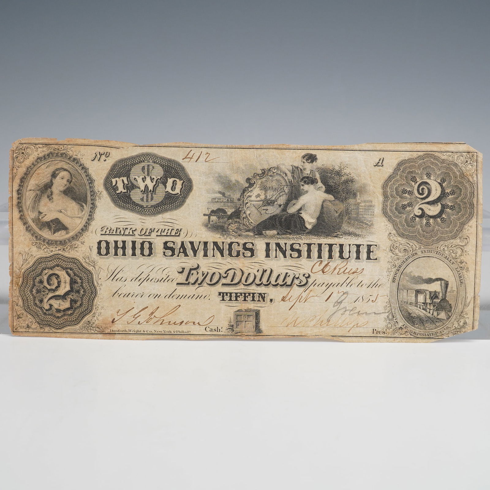 US 1855 $2 Obsolete Note, Ohio Savings Institute, Tiffin: A rare 1855 $2 obsolete banknote from Ohio Savings Institute, Tiffin, Ohio. Dated September 1, 1855. Handwritten serial 412. Text includes TWO DOLLARS payable to bearer on demand, STOCKHOLDERS