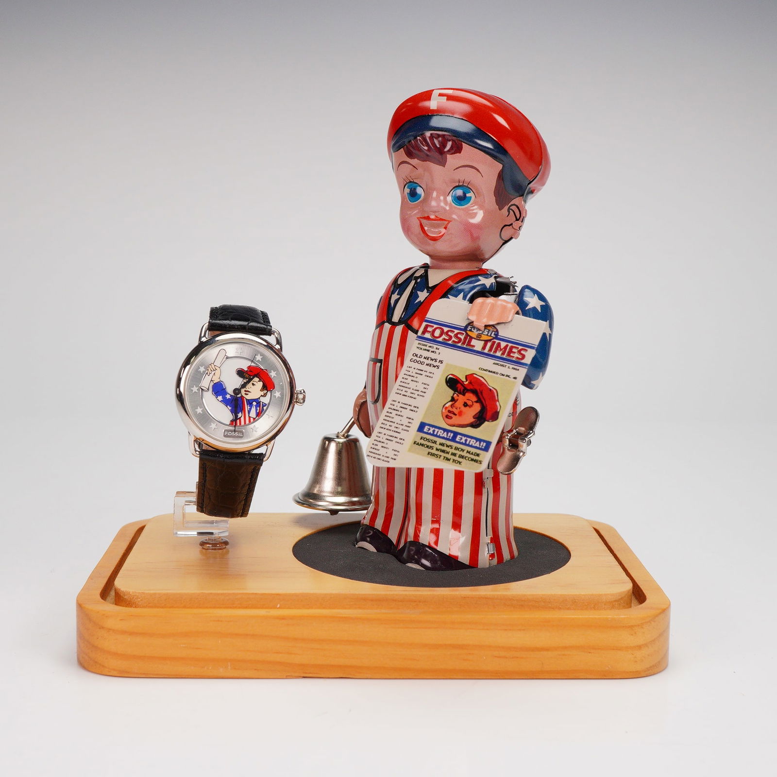 Fossil Collector's Set, News Boy with Tin Toy and Wristwatch (1 of 5)