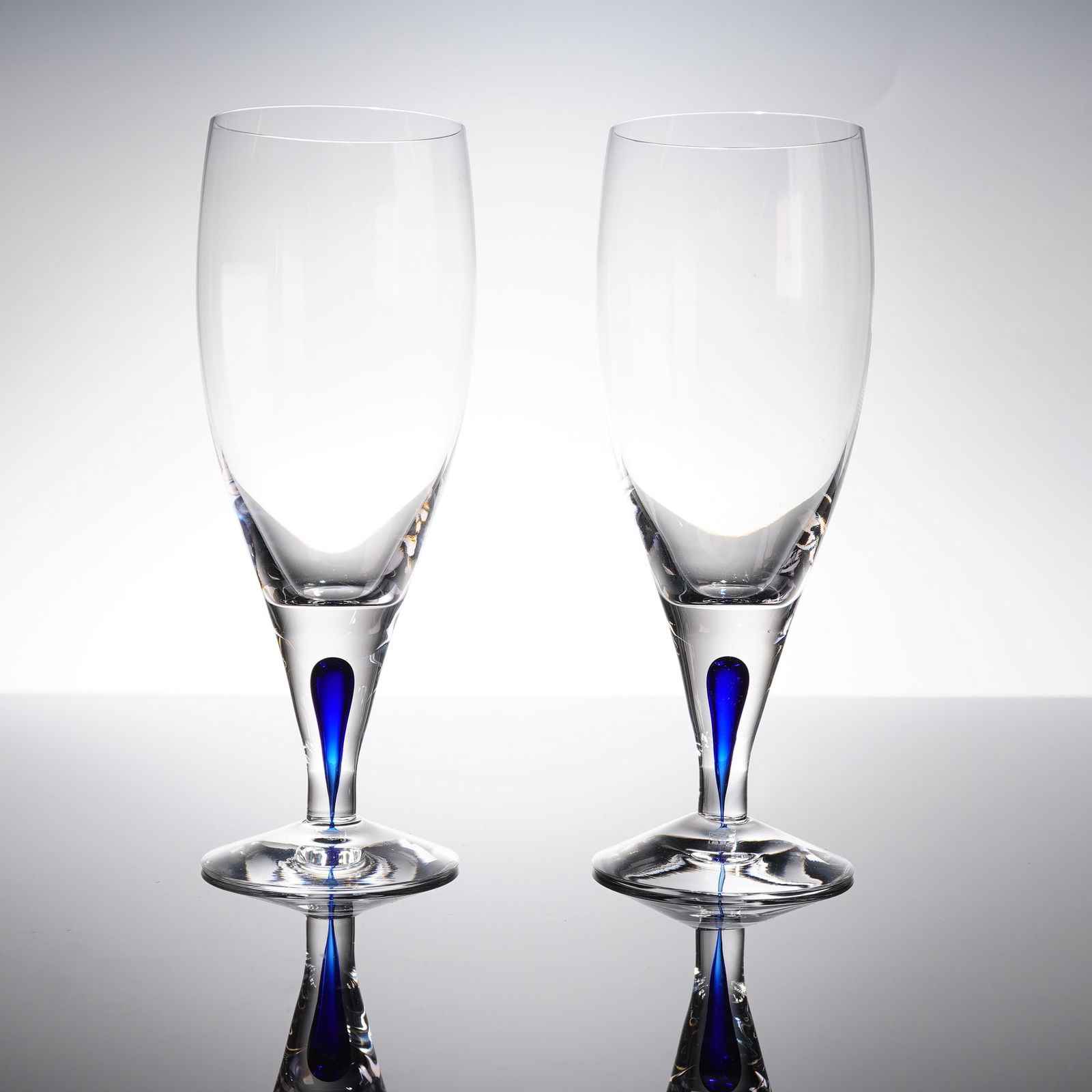 A Pair of Orrefors Intermezzo Blue Crystal Champagne Flutes (1 of 4)
