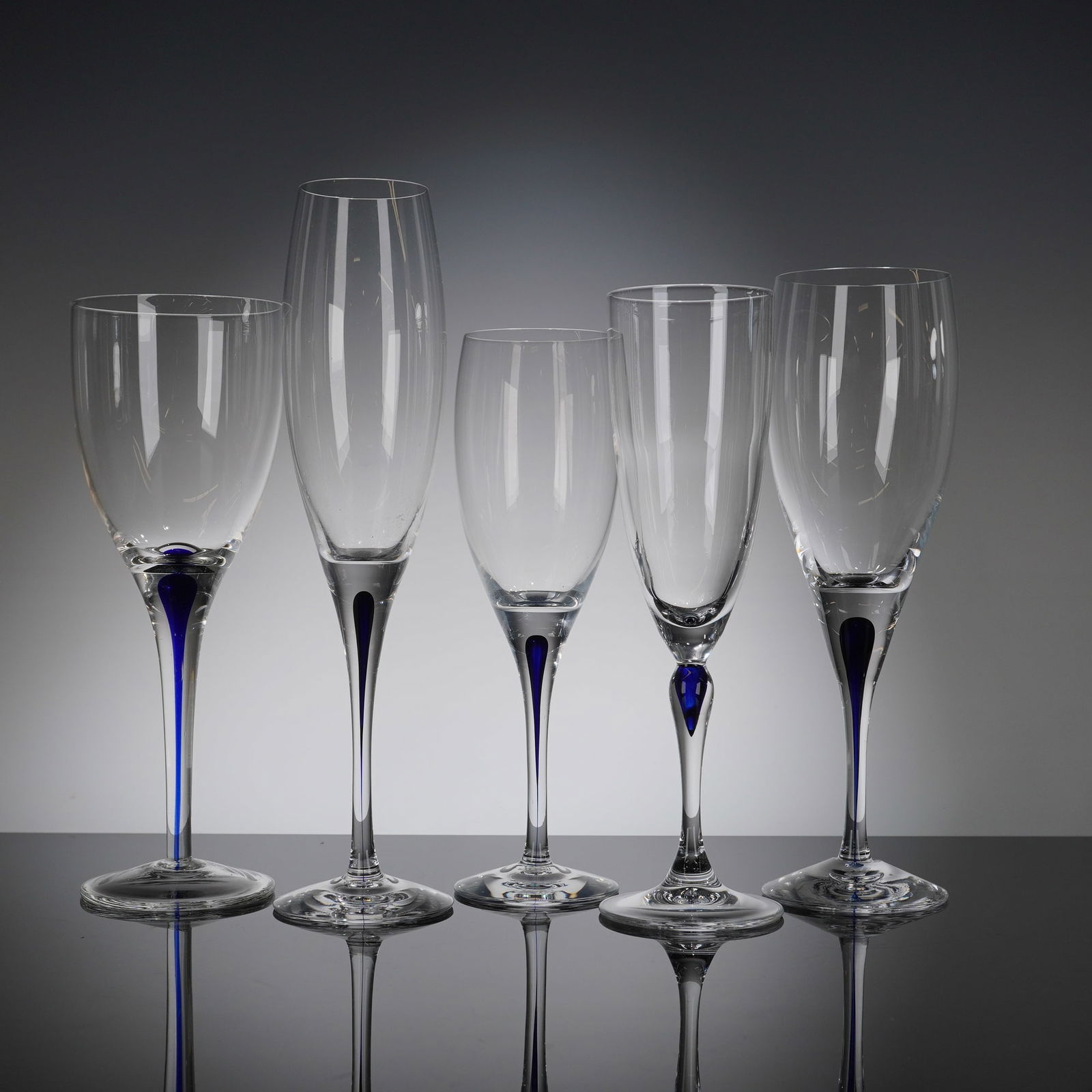 A Collection of Five Orrefors Intermezzo Blue Crystal Glasses (1 of 5)