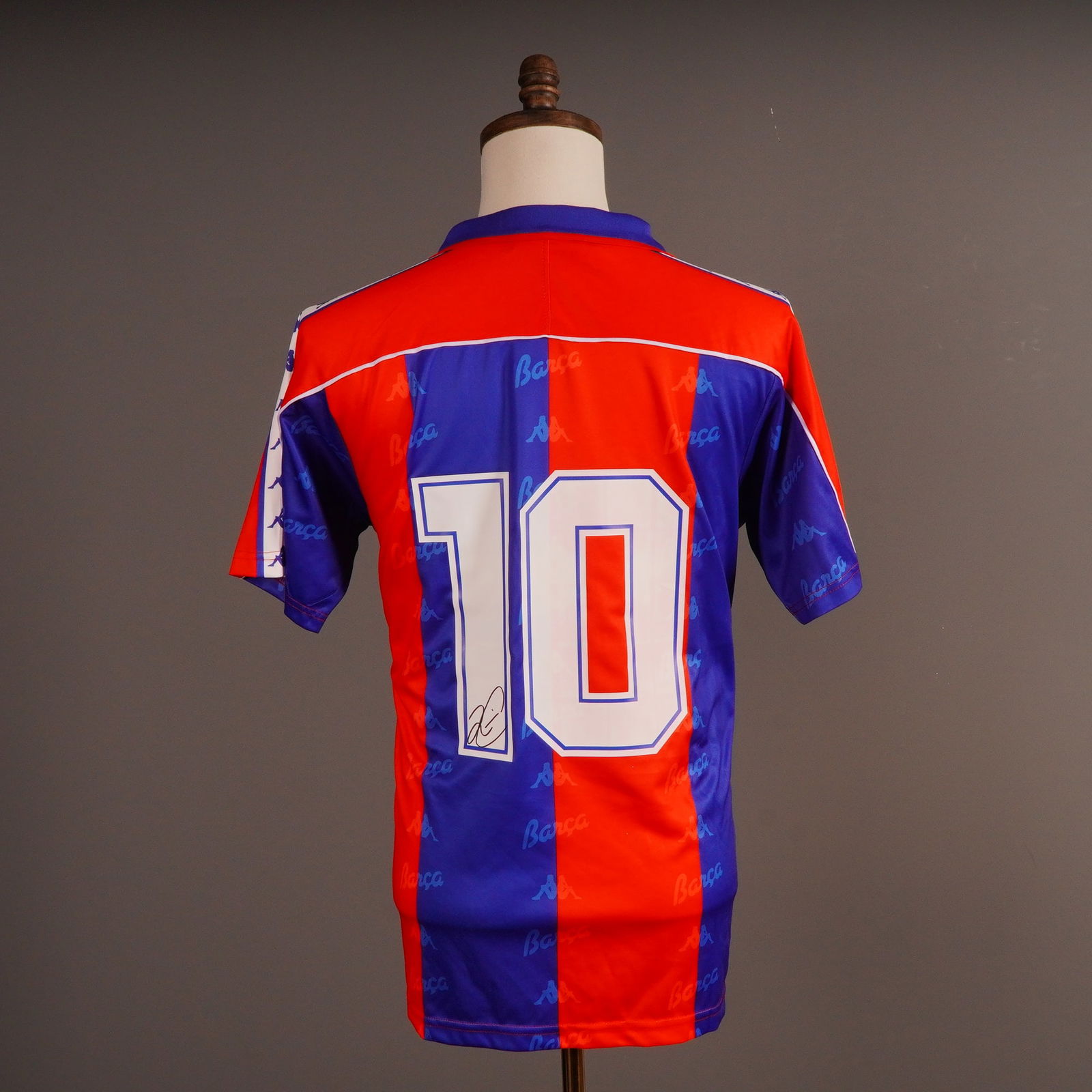 Romario Autographed FC Barcelona 1992-95 Home Shirt by Kappa with ICONS COA: This lot consists of a vintage FC Barcelona 1992-95 Home Shirt, manufactured by Kappa, and its accompanying Certificate of Authenticity (COA). This autographed Romario jersey is constructed of synthet