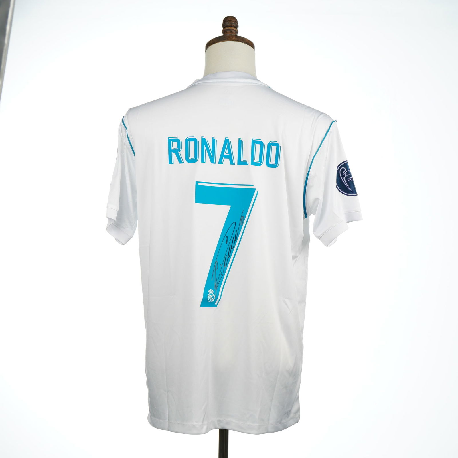 Cristiano Ronaldo Signed Real Madrid 2018 UCL Final Replica Home Shirt: A lot consisting of two items: a customized Real Madrid 2018 UCL Final Replica Home Shirt and a Certificate of Authenticity (COA). This item is The Dugout memorabilia Real Madrid Signed Replica Home S