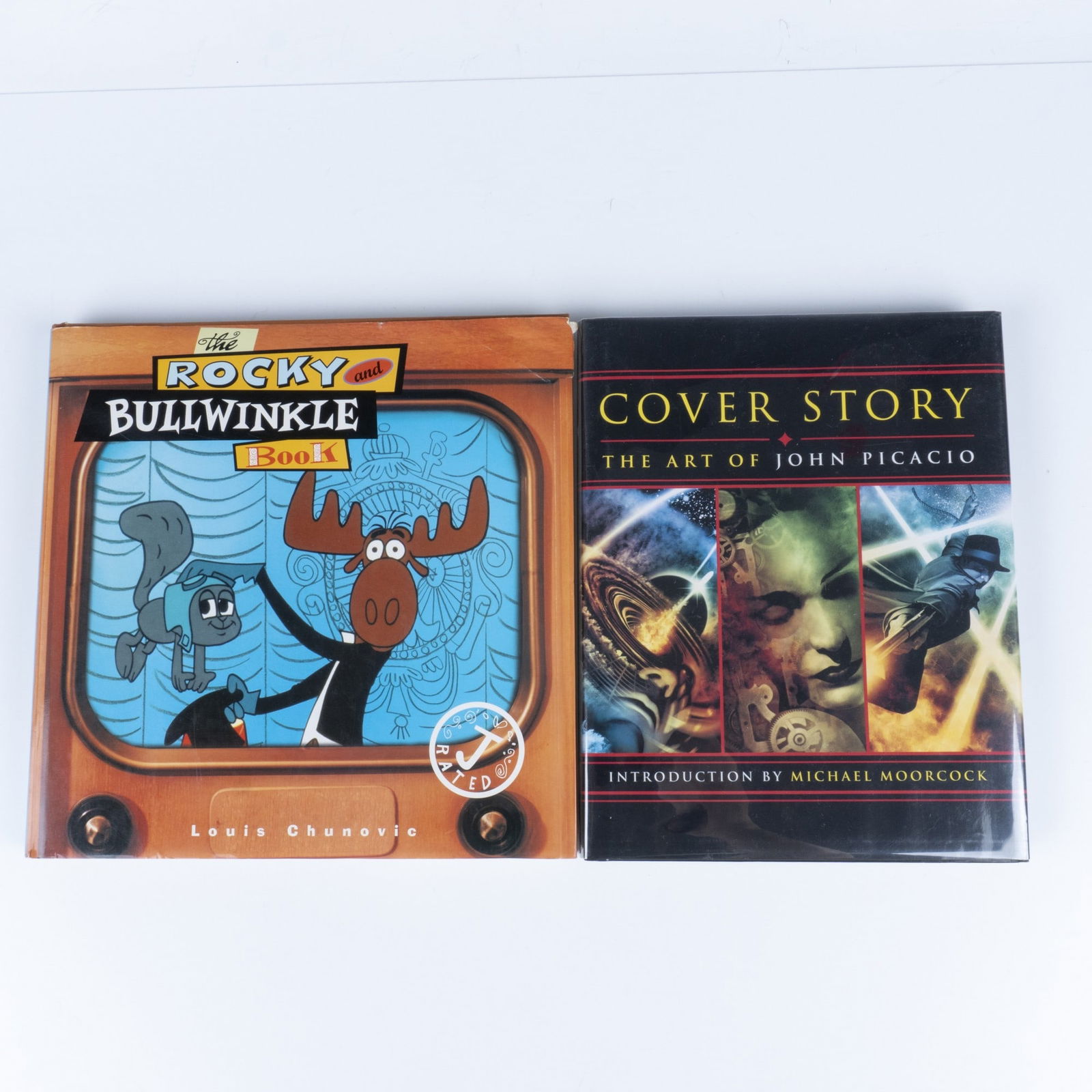 2pc Art Appreciation Books: A set of two books includes The Rocky and Bullwinkle Book by Louis Chunovic, which explores the behind-the-scenes production of the popular show, and Cover Story: The Art of John Picacio published by