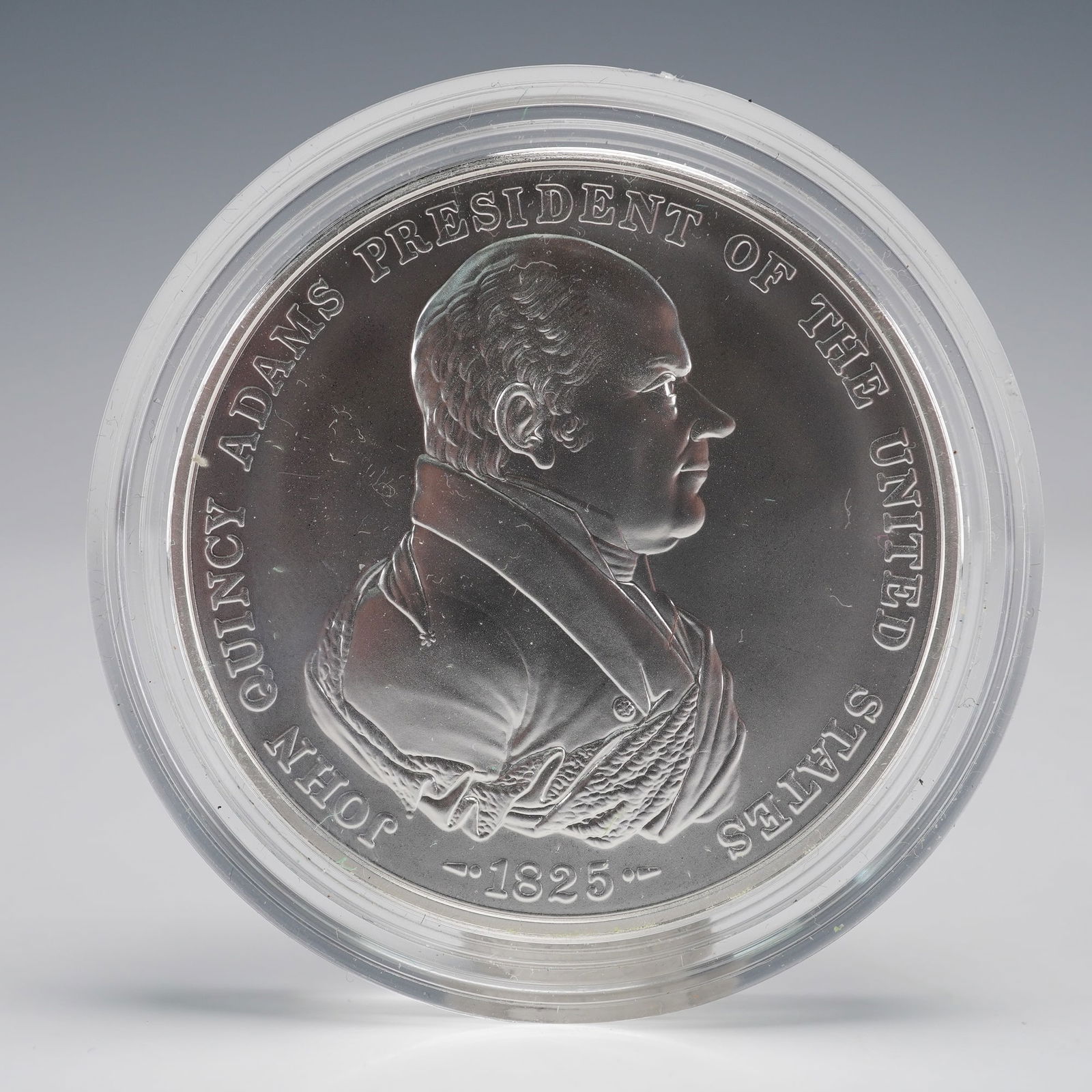 US John Quincy Adams Presidential Silver Medal 1 oz .999 Proof: Official US Mint Presidential Silver Medal, issued as part of the Presidential Silver Medals Program, commemorating the 6th President of the United States, John Quincy Adams. The obverse features the