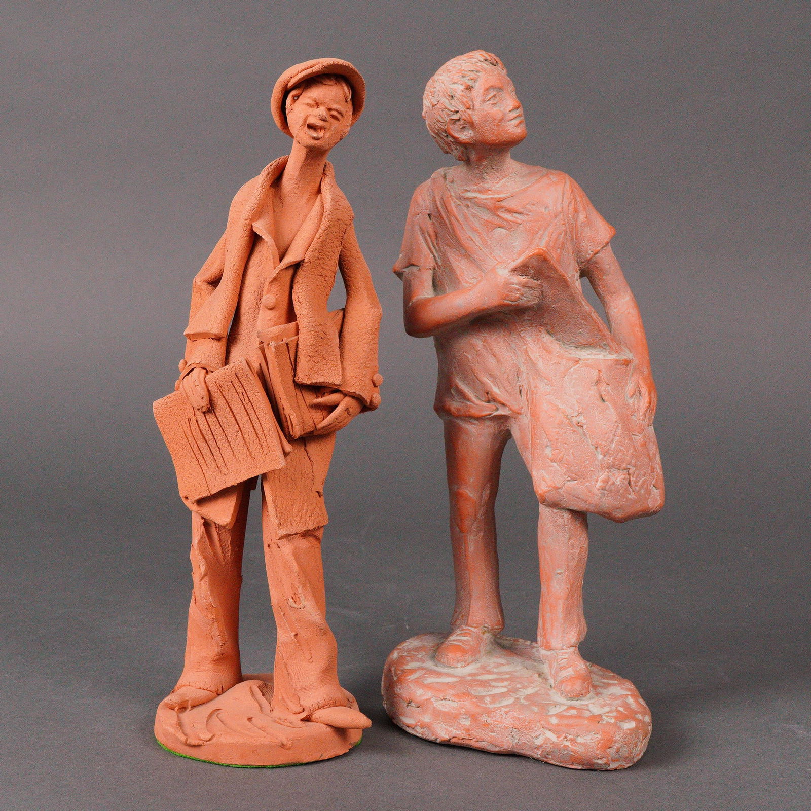 Group of Two Terracotta Newspaper Men Figurines (1 of 5)