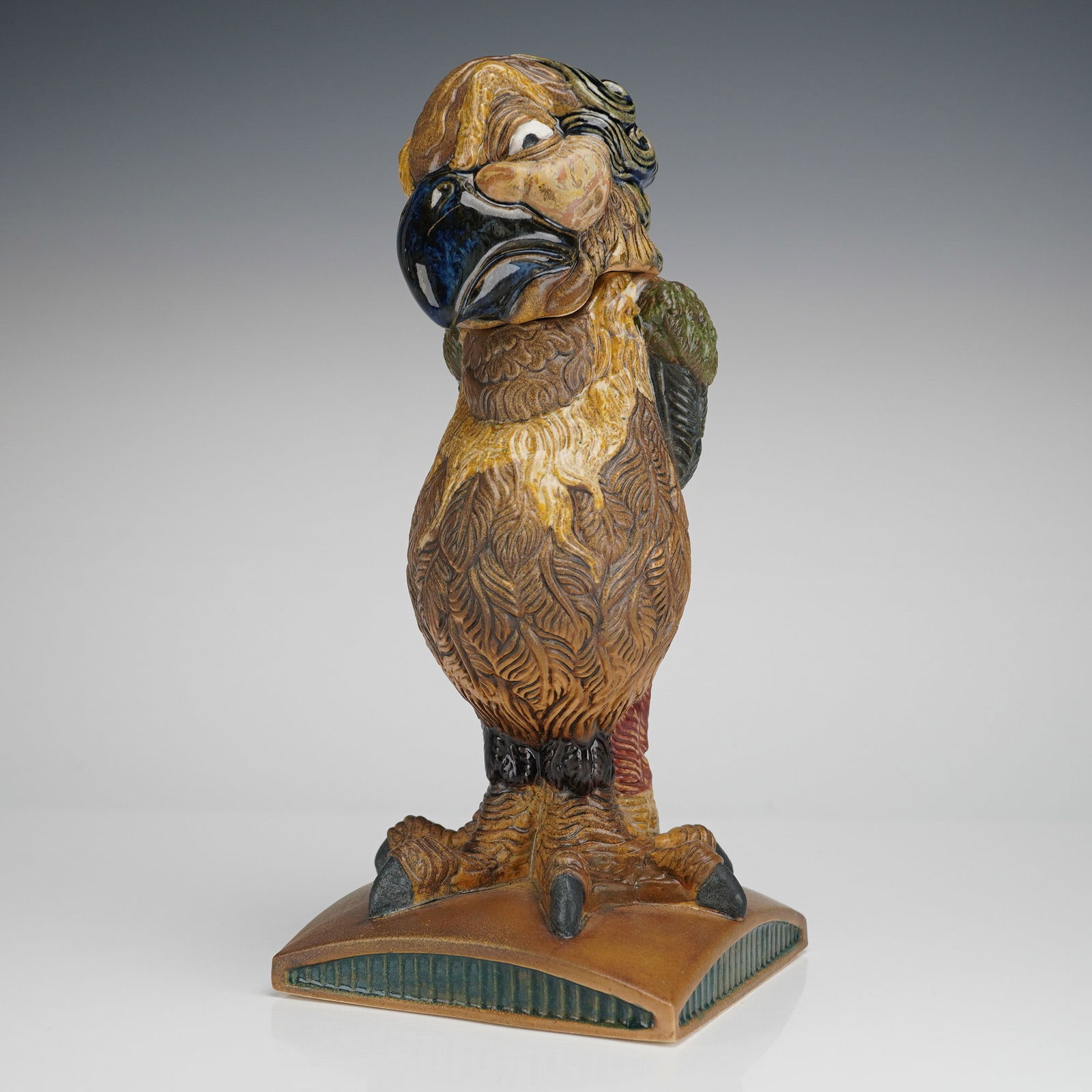 Burslem Pottery Grotesque Bird The Judge Court House Range Andrew Hull: A Burslem Pottery grotesque bird titled The Judge, from the Court House range, designed by Andrew Hull and inspired by the work of the Martin Brothers. The figure is strongly sculpted with exaggerated