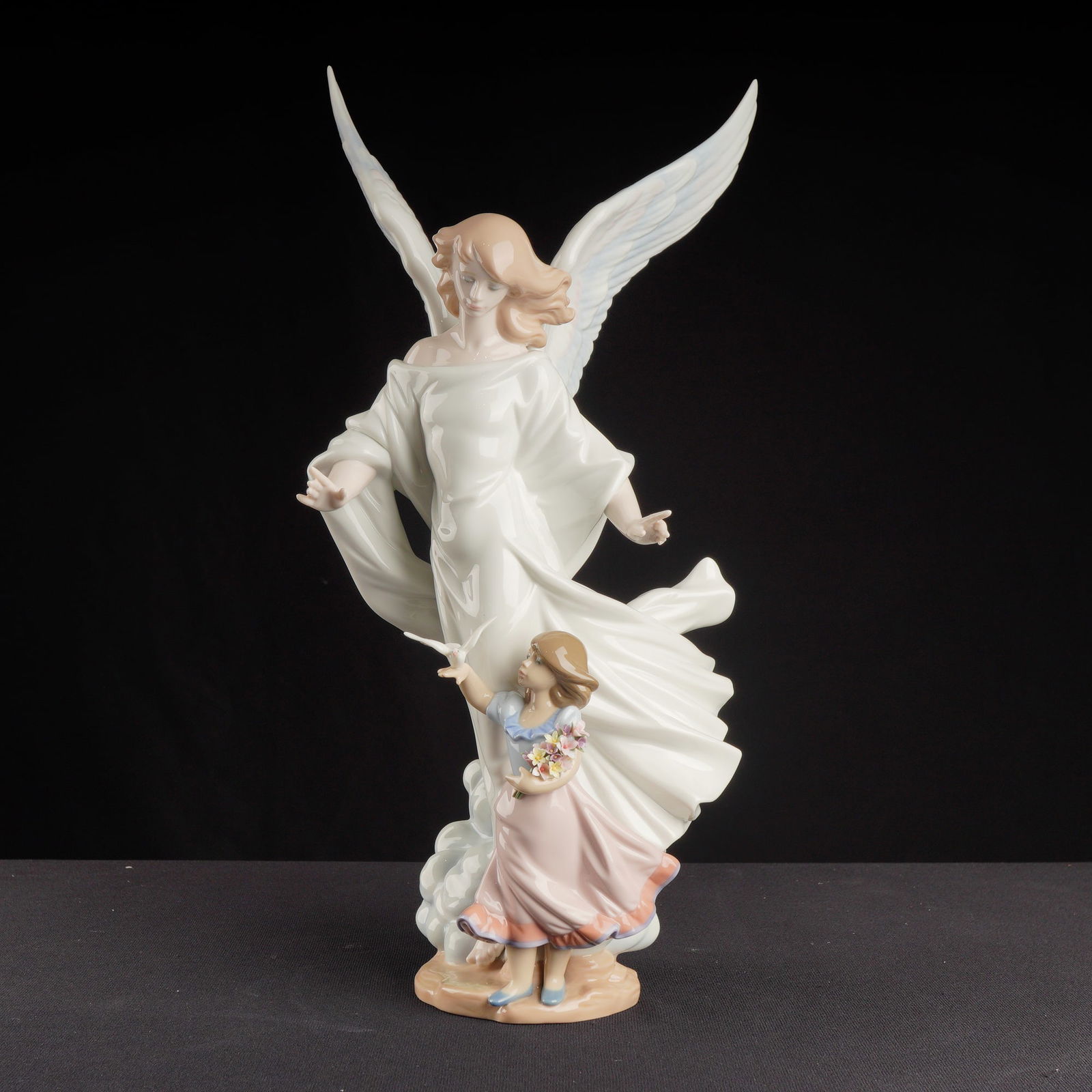 Lladro Porcelain Sculpture Guardian Angel 01006352 with Base: The grouping of three items consisting of a Lladro Porcelain Sculpture titled Guardian Angel, the original Certificate of Authenticity (COA), and the original branded shipping box. The sculpture,