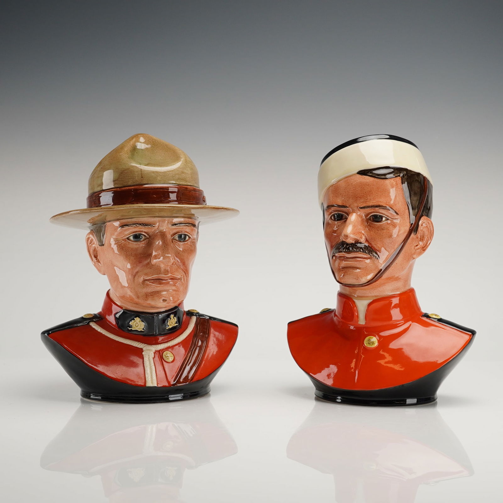 A Pair of Royal Doulton Royal Canadian Mounted Police Character Jugs (1 of 3)