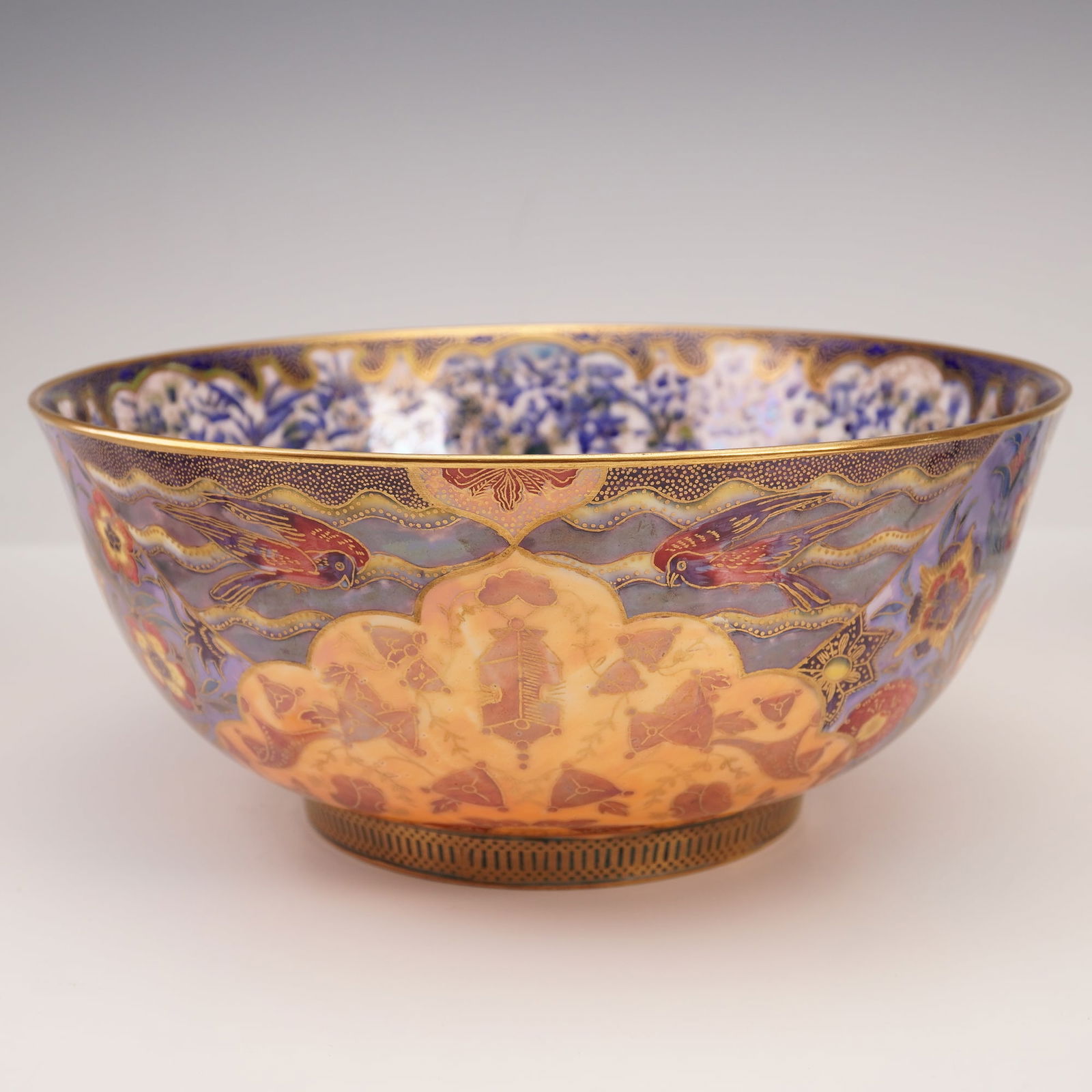 Wedgwood Fairyland Lustre Imperial Bowl, Nizami: Featuring a design inspired by the Persian poet Nizami Ganjavi (c. 1141-1209) and the miniature paintings from his epic Khamse. The bowl's interior is decorated in the center with a brightly colored s