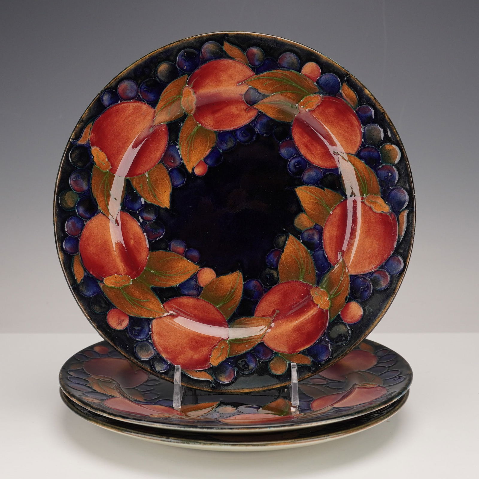 Three Moorcroft Pomegranate Pattern Earthenware Plates (1 of 4)