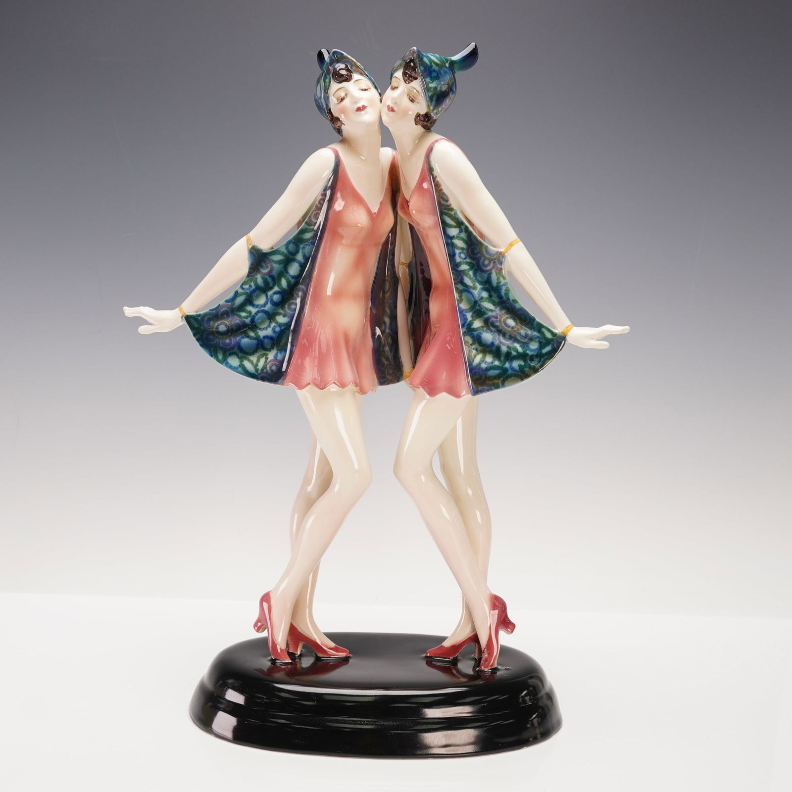 Goldscheider by Stefan Dakon Porcelain Figurine, The Dolly Sisters: A superb Art Deco porcelain sculpture by Goldscheider Wien, modeled by Stefan Dakon. This expressive figure depicts the famous Dolly Sisters, twin cabaret dancers from Budapest who achieved