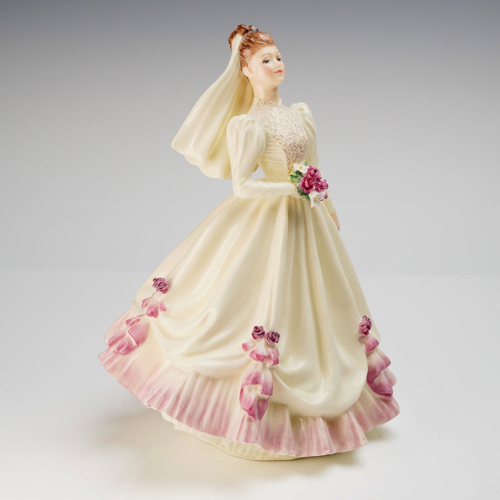 Royal Doulton Prototype Figurine Bride HN3285: A single glazed porcelain figurine by Royal Doulton, titled "Bride" (HN3285), modeled as a standing female figure dressed in a traditional wedding gown. The figurine is decorated in creamy ivory