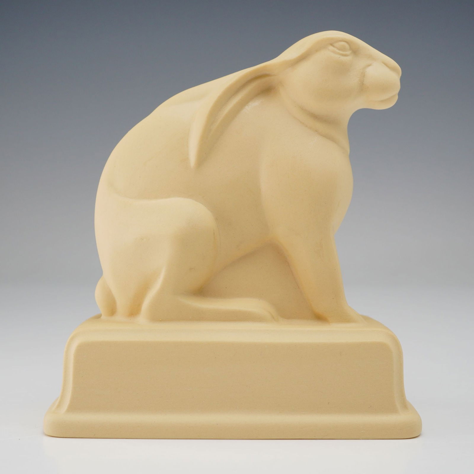 Wedgwood by John Skeaping Yellow Ceramic Art Deco Hare Figurine: Part of the Barlaston Collection, and exclusive to the Wedgwood Visit of Center. A ceramic figure of a seated hare, designed by John Skeaping for Wedgwood. This yellow colored figurine depicts a styli
