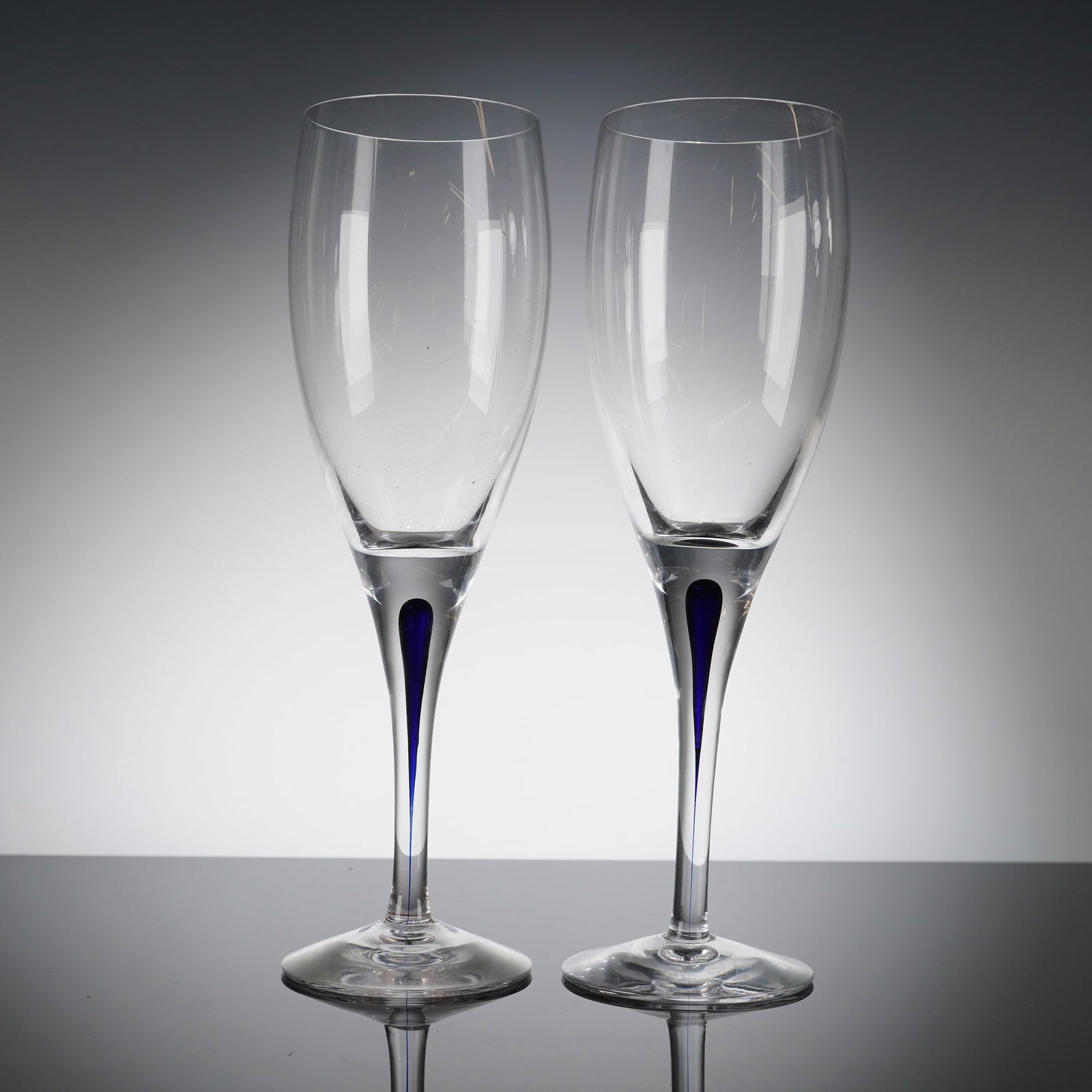 A Pair of Orrefors Intermezzo Blue Crystal Champagne Flutes (1 of 5)