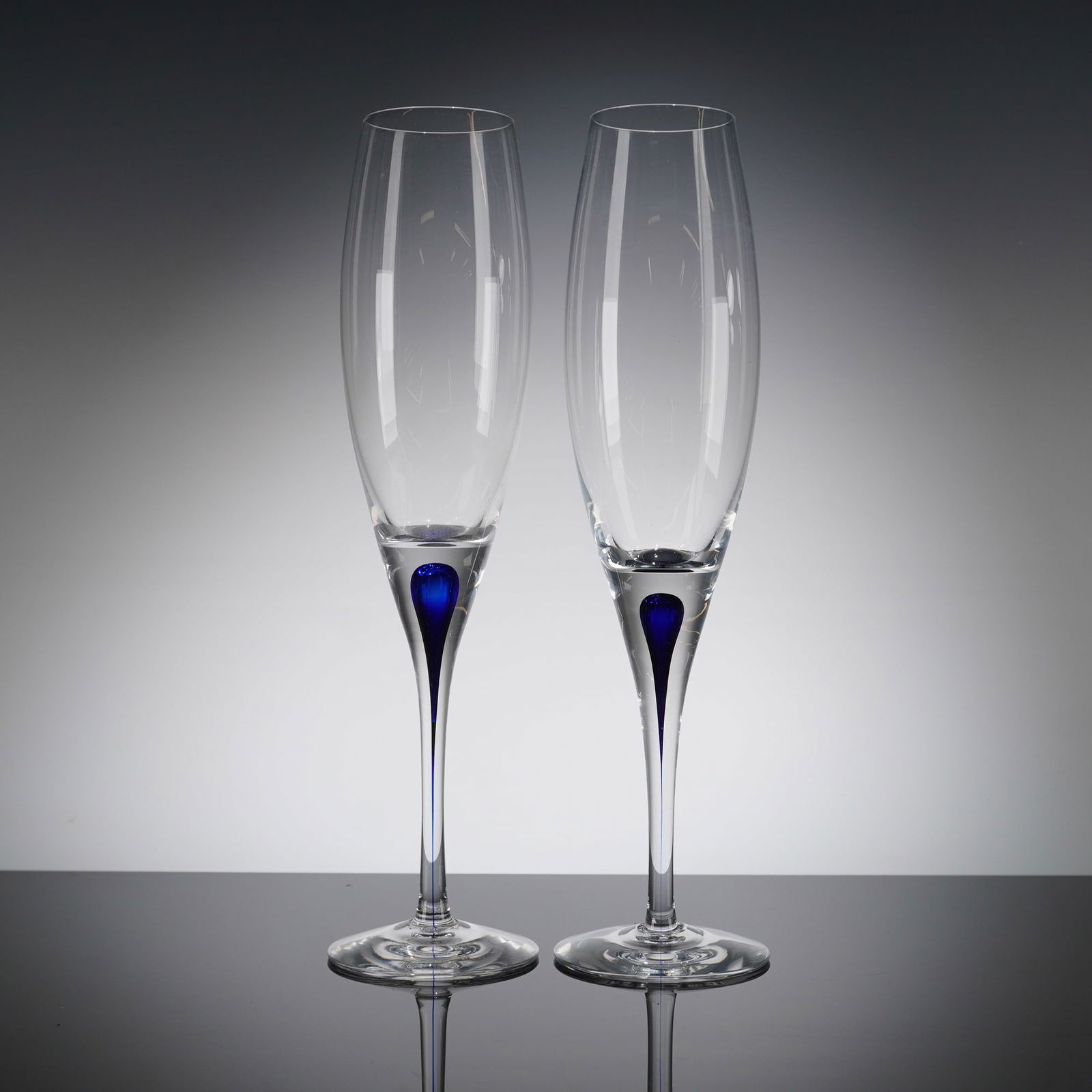 A Pair of Orrefors Intermezzo Blue Crystal Champagne Flutes (1 of 4)