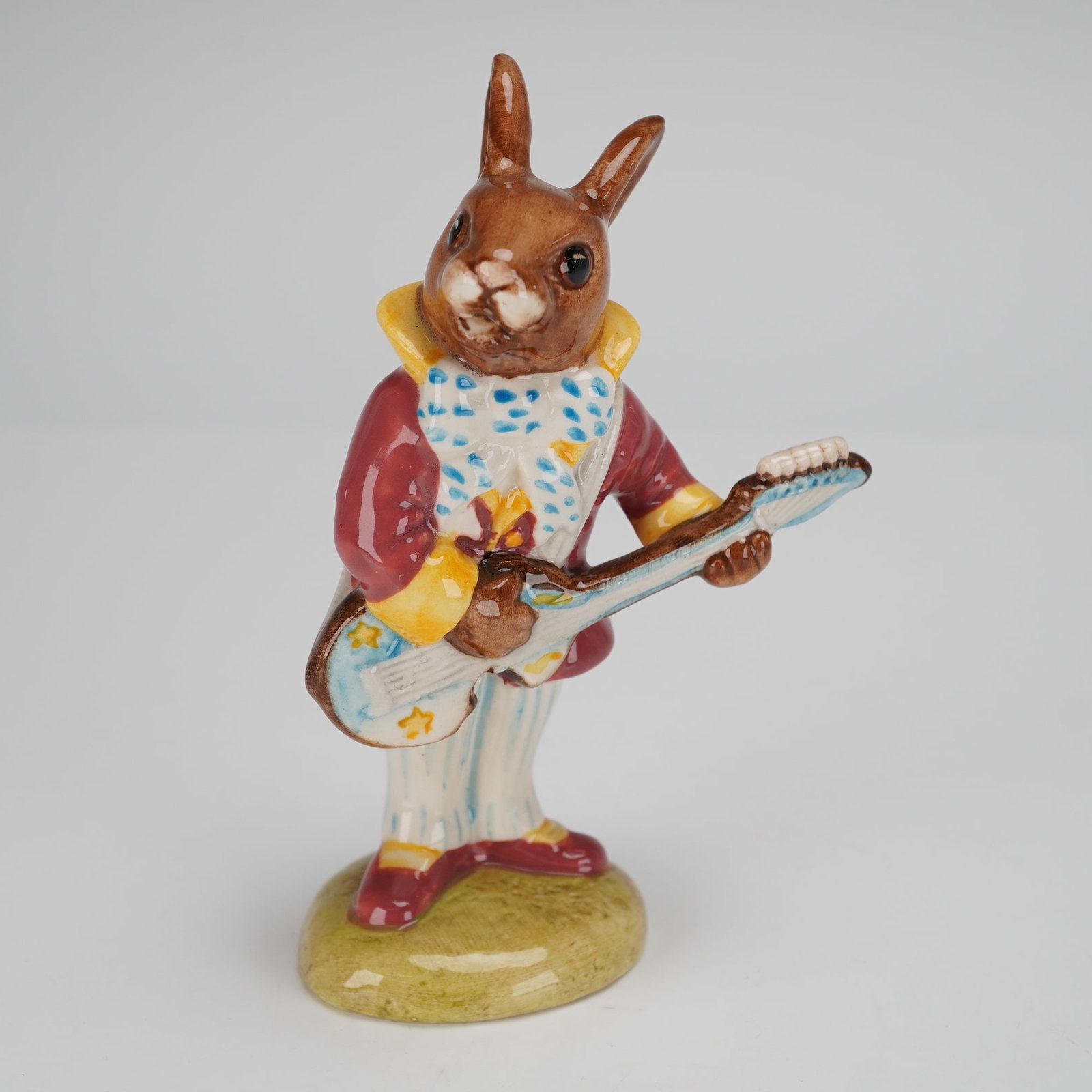 Royal Doulton Bunnykins Figurine, Mr. Bunnybeat Strumming DB16 (1 of 3)