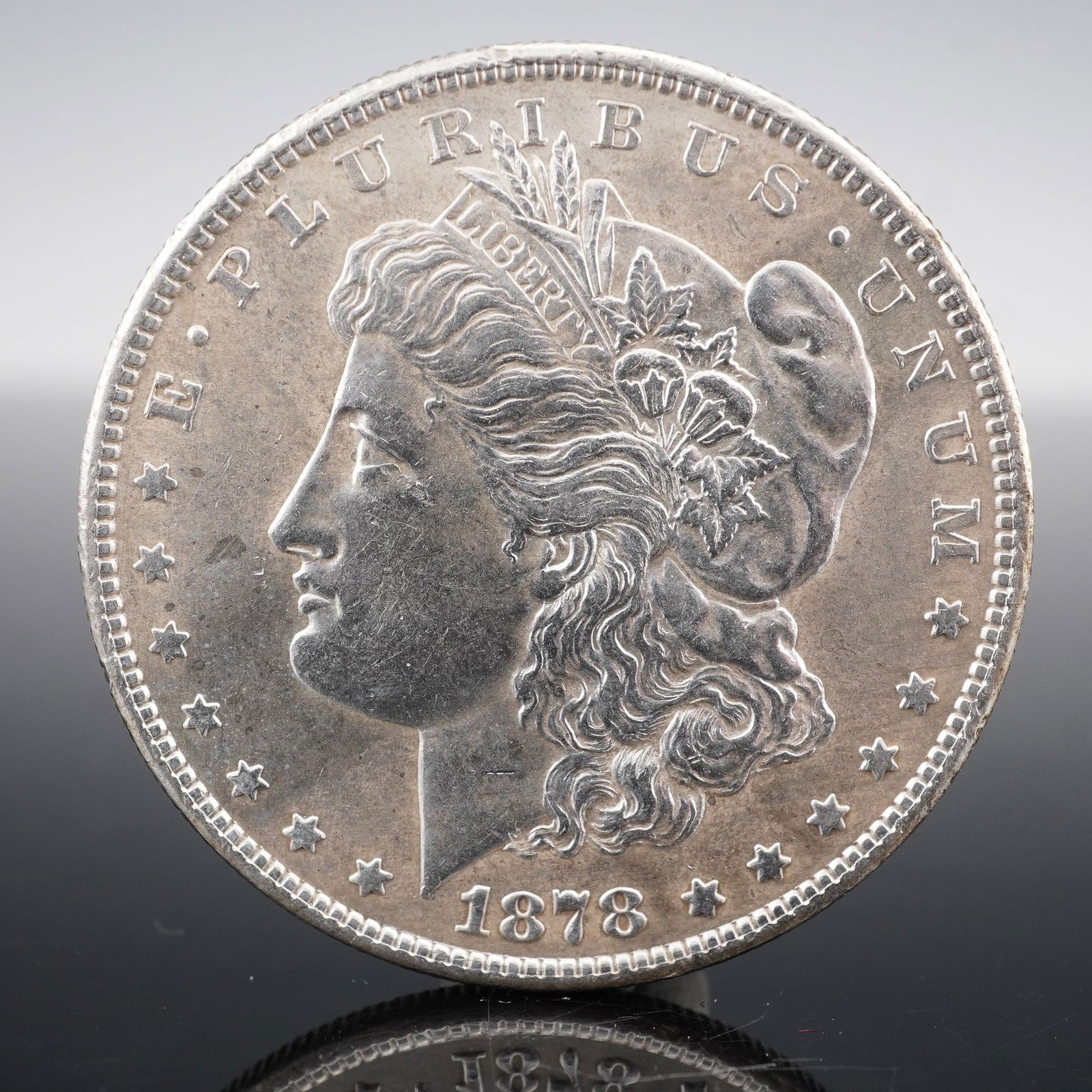 1878-S Morgan Silver One Dollar Coin Concave Breast (1 of 3)