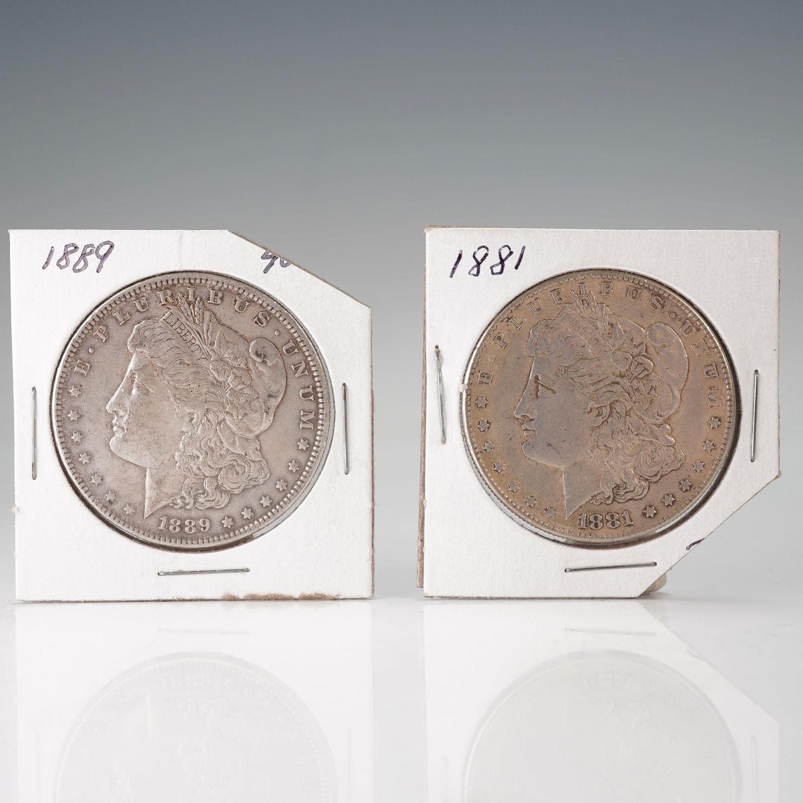 2pc 1881 and 1889 Morgan Silver Dollars (1 of 2)