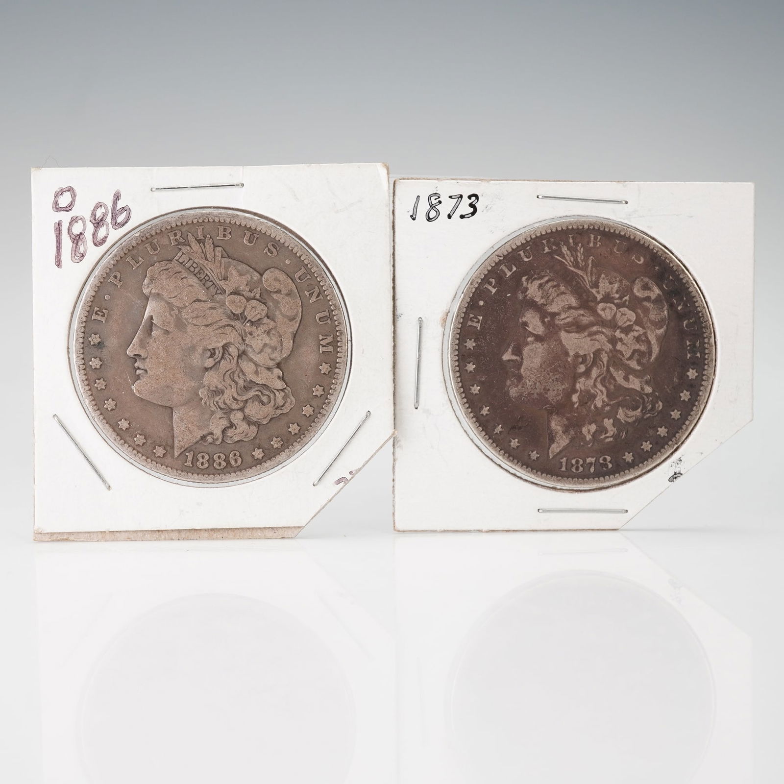 2pc 1878 and 1886 Morgan Silver Dollars (1 of 2)