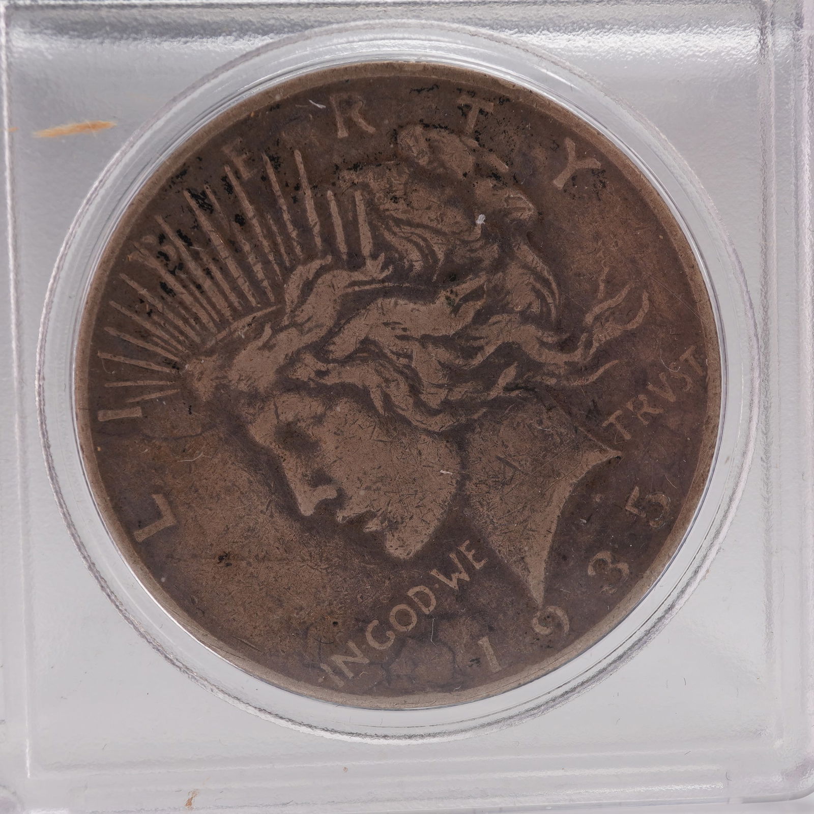 1935-S Liberty Silver Peace Dollar: The 1935-S Peace Dollar was struck at the San Francisco Mint, marking one of the final years of production for this iconic design. The obverse depicts the left-facing profile of Lady Liberty, crowned