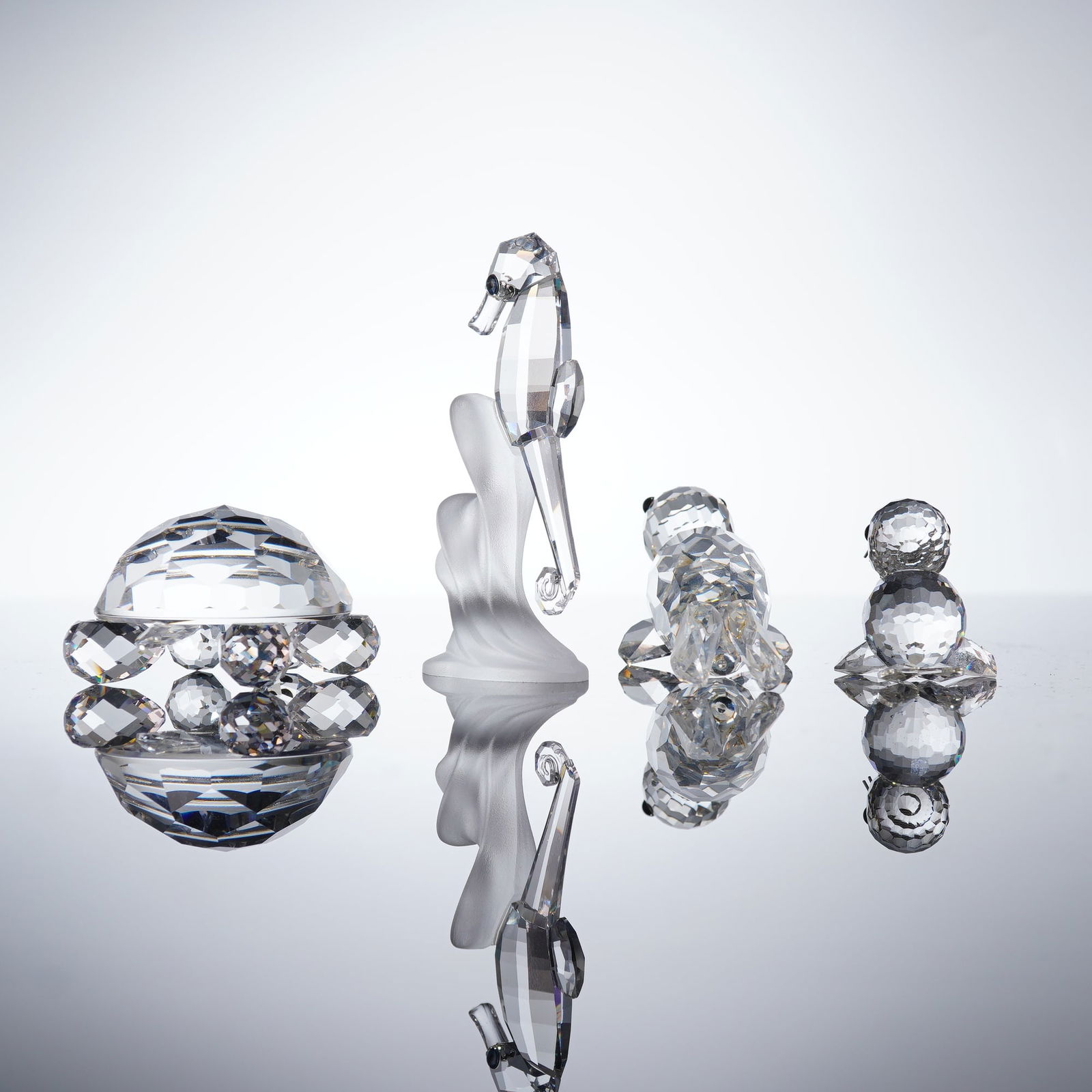 A Collection of Four Swarovski Silver Crystal Figurines (1 of 5)