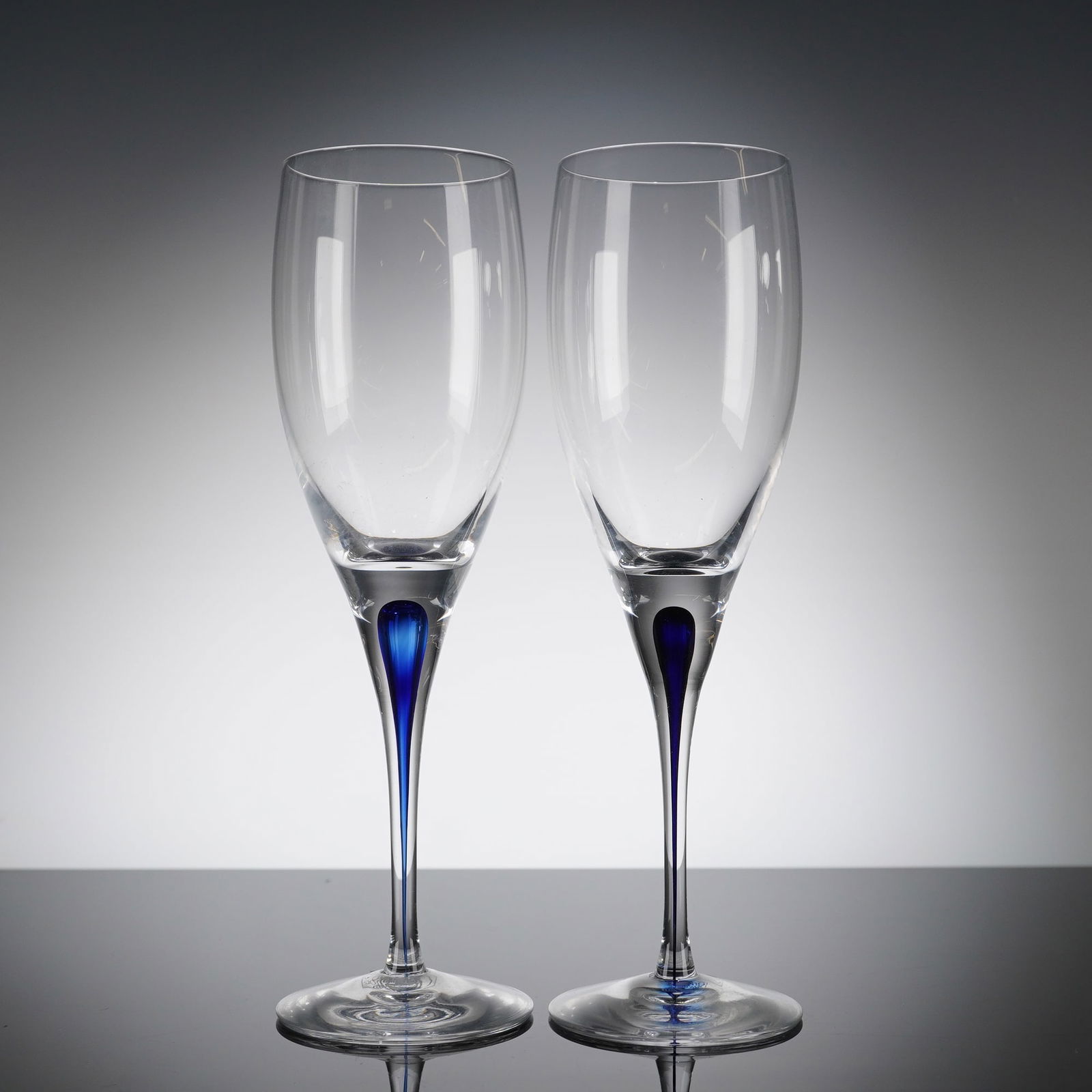 A Pair of Orrefors Intermezzo Blue Crystal Champagne Flutes (1 of 5)