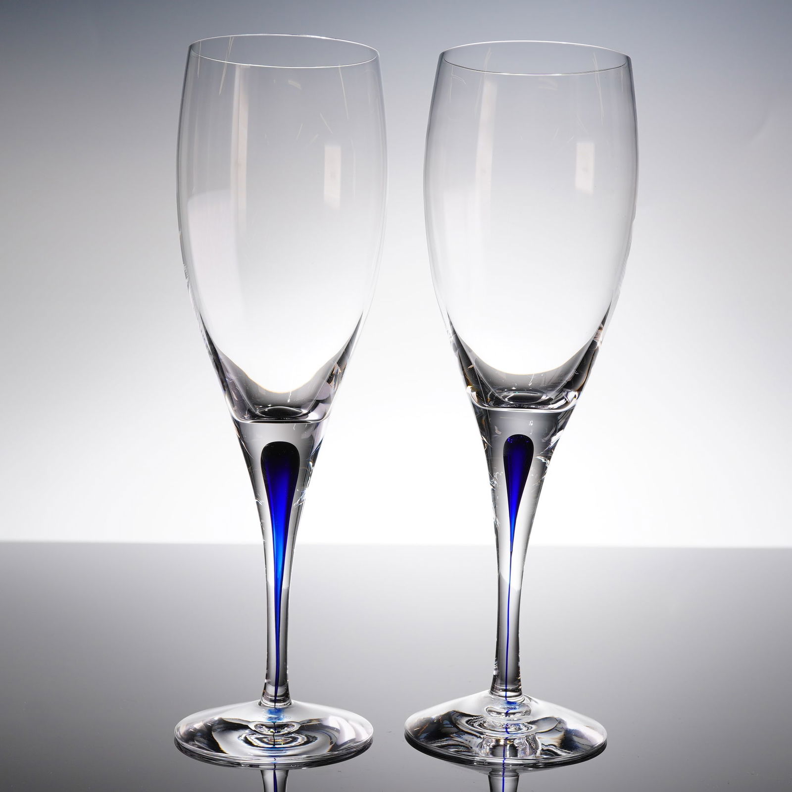 A Pair of Orrefors Intermezzo Blue Crystal Flutes (1 of 4)