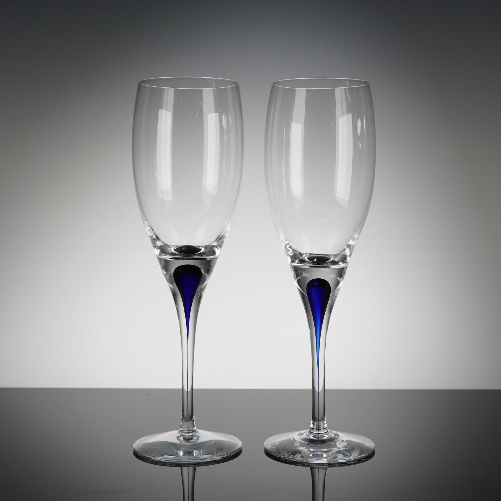 A Pair of Orrefors Intermezzo Blue Crystal Flutes (1 of 4)