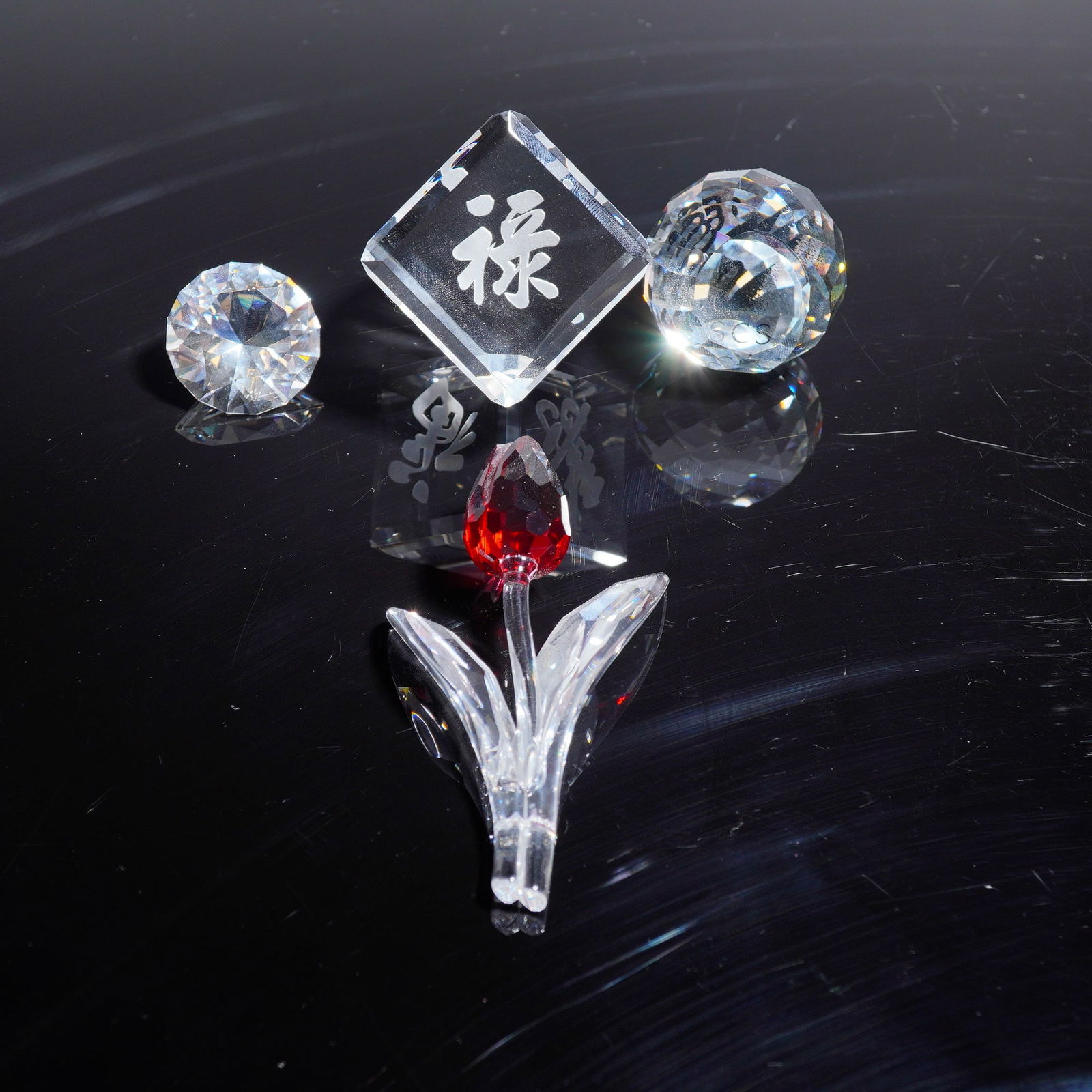 A Collection of four Swarovski SCS Crystal Paperweights (1 of 5)
