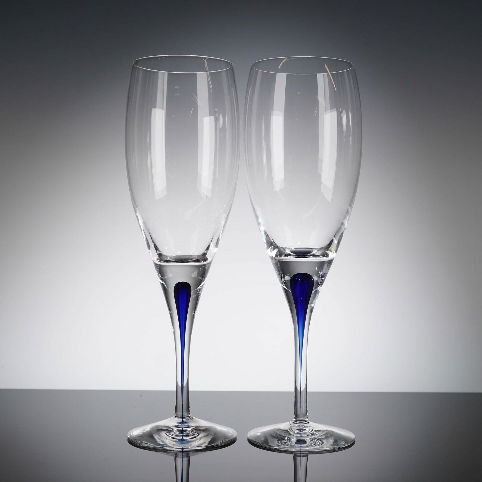 A Pair of Orrefors Intermezzo Blue Crystal Champagne Flutes (1 of 4)