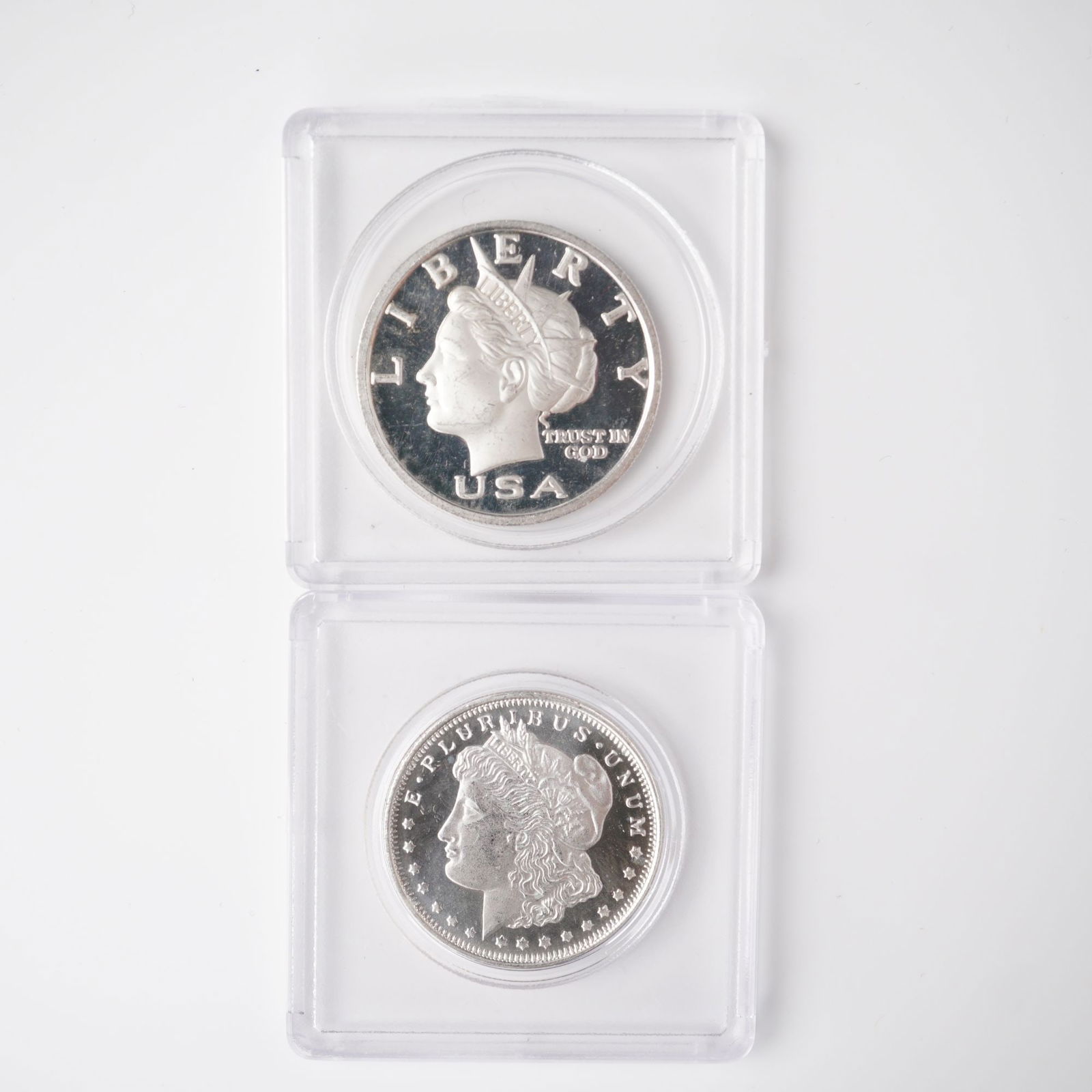 2pc 2003 1/2 Troy Ounce Five Dollar Silver Rounds: Two 2003 Liberty Dollar silver rounds, each denominated as five dollars and struck in .999 fine silver with a weight of one-half troy ounce. The obverse features a rendition of Liberty's profile crown