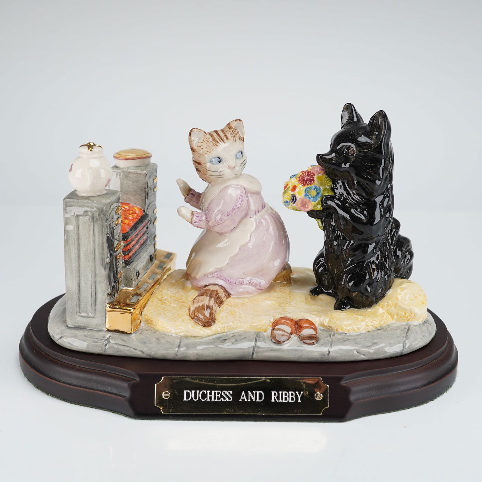 Beswick Beatrix Potter's Figurine, Duchess and Ribby: Part of the "Peter Rabbit and Friends" collection. Beswick Beatrix Potter figurine, "Duchess and Ribby," depicts Ribby by a hearth looking over her shoulder at Duchess, who is holding a bouquet of flo
