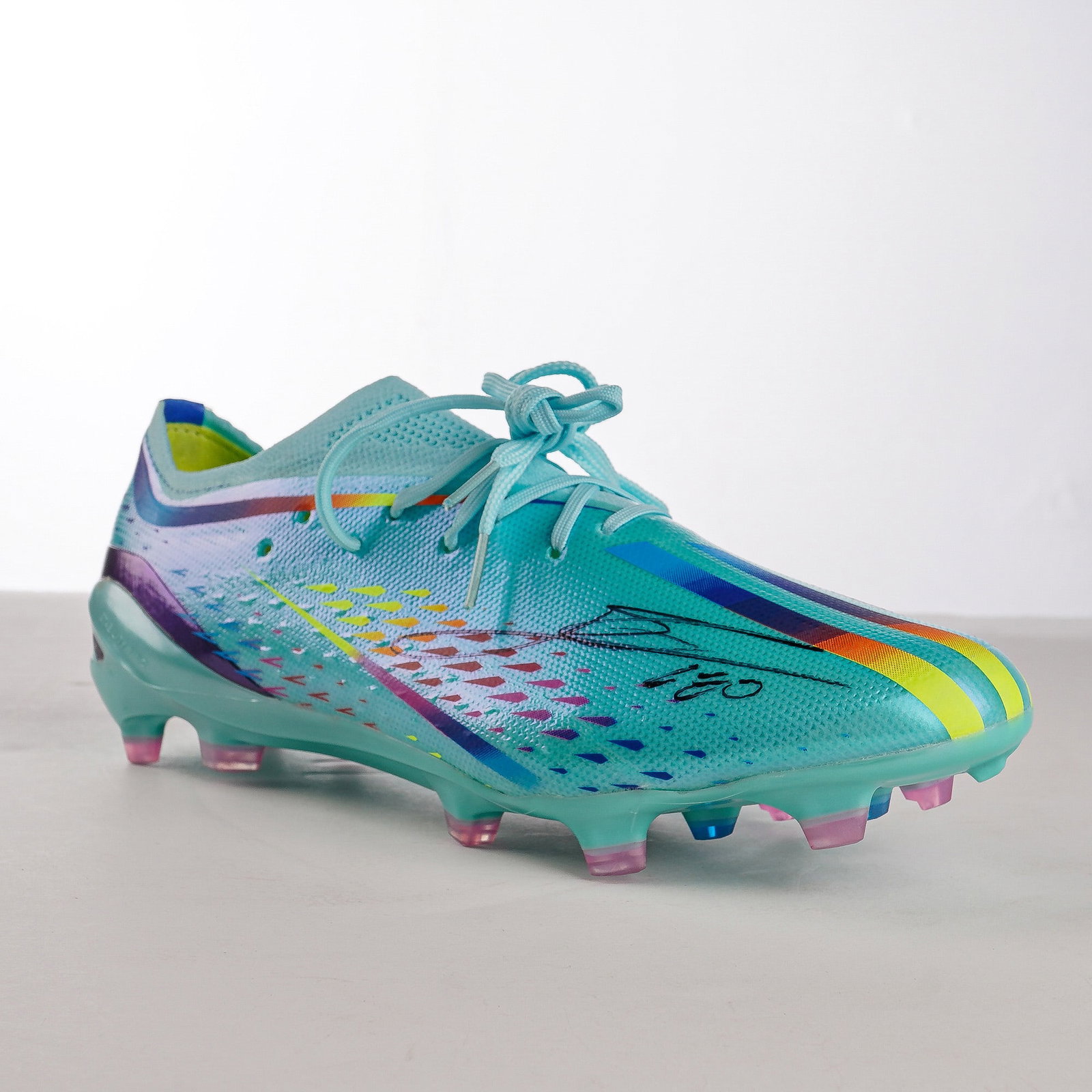 Lionel Messi Signed Adidas X Speedportal.1 Al Rihla Boot w/ COA: Adidas X Speedportal.1 Al Rihla edition soccer boot officially signed by Lionel Messi. The boot features a light blue synthetic upper with multi-colored graphic accents. The construction includes a Sp