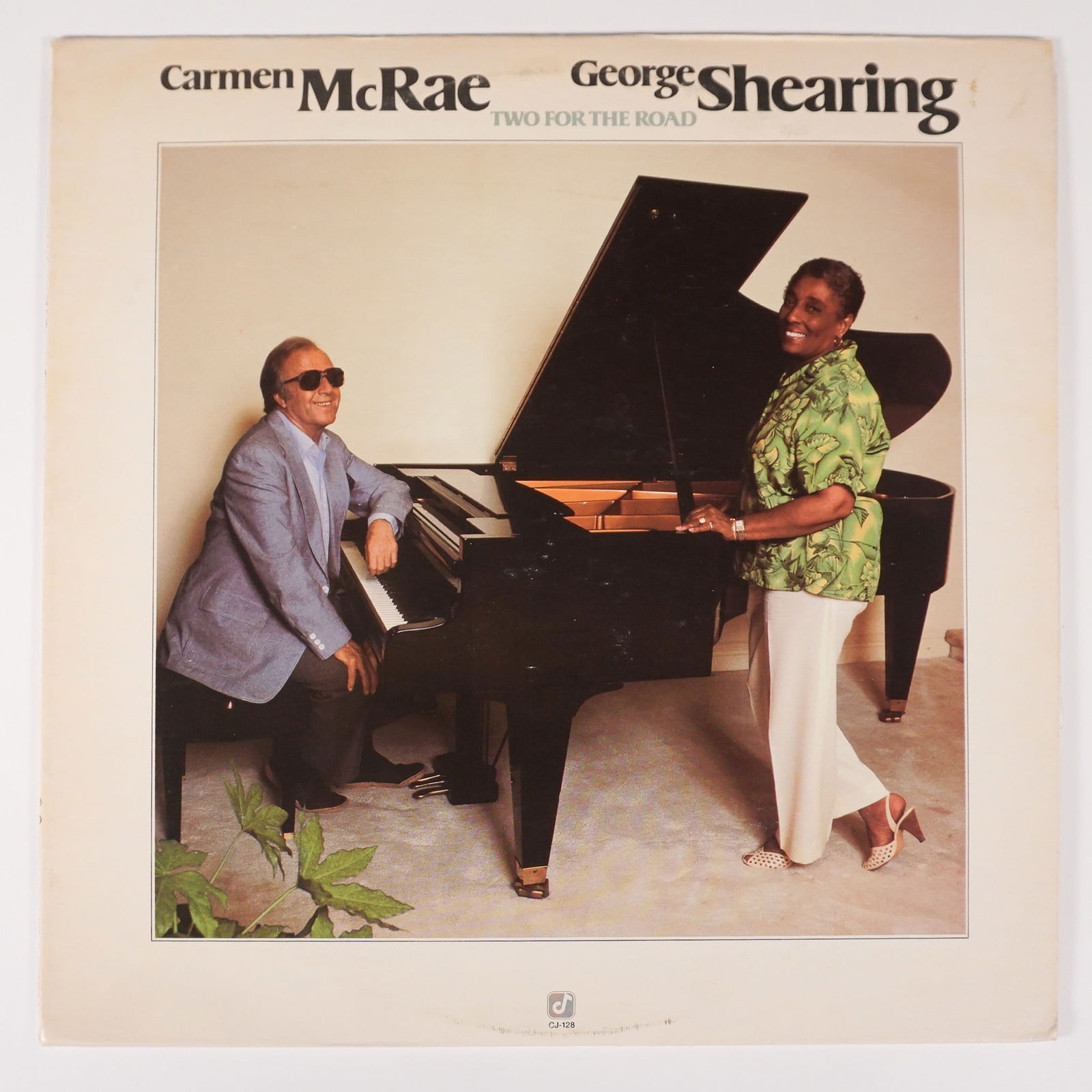 Carmen McRae & George Shearing Vinyl Album, Two for the Road: This lot features a vinyl album Two for the Road, by Carmen McRae and George Shearing. The album was released under the CJ-128 catalog number by Concord Jazz. Side One includes tracks such as "I Don't