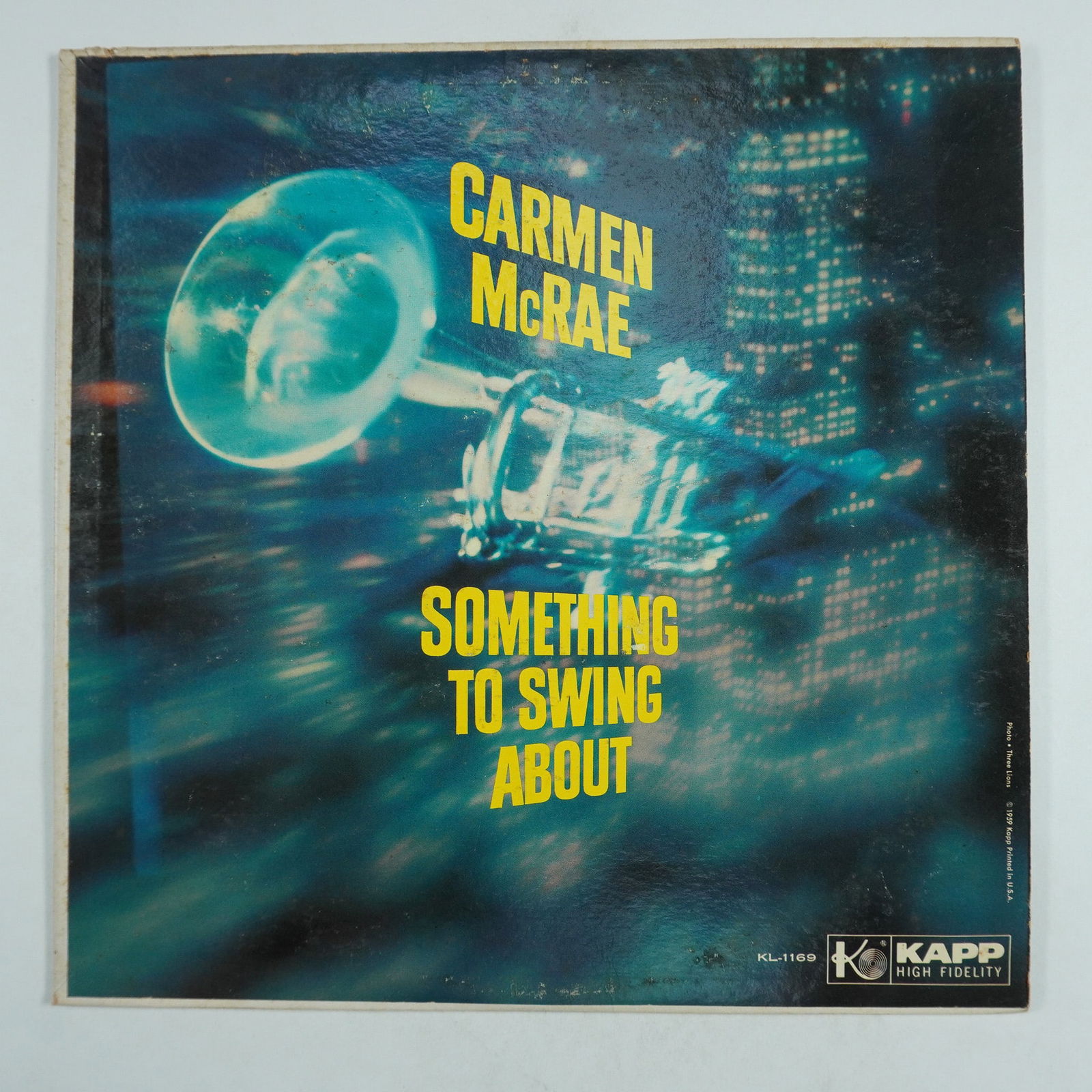 Carmen McRae Vinyl Record, Something to Swing About KAPP KL-1169: This vintage vinyl record features Carmen McRae's album Something to Swing About, released under KAPP Records (KL-1169). The record comes in its original sleeve with artwork featuring a dynamic image