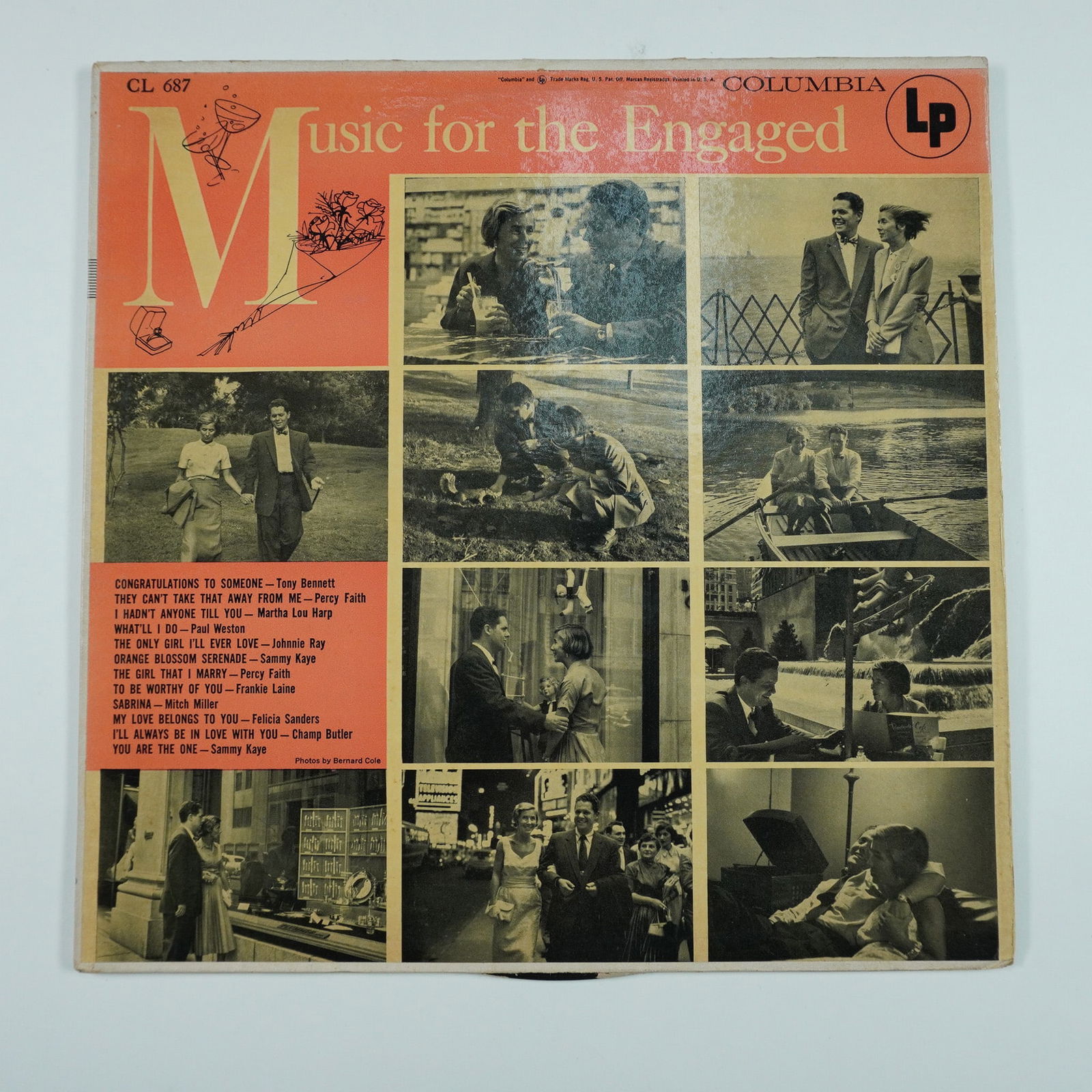Columbia Records Vinyl LP, Music For The Engaged: Columbia Records presents 'Music For The Engaged', a compilation album featuring a collection of romantic and sentimental songs performed by various artists. This vintage LP includes classic love song