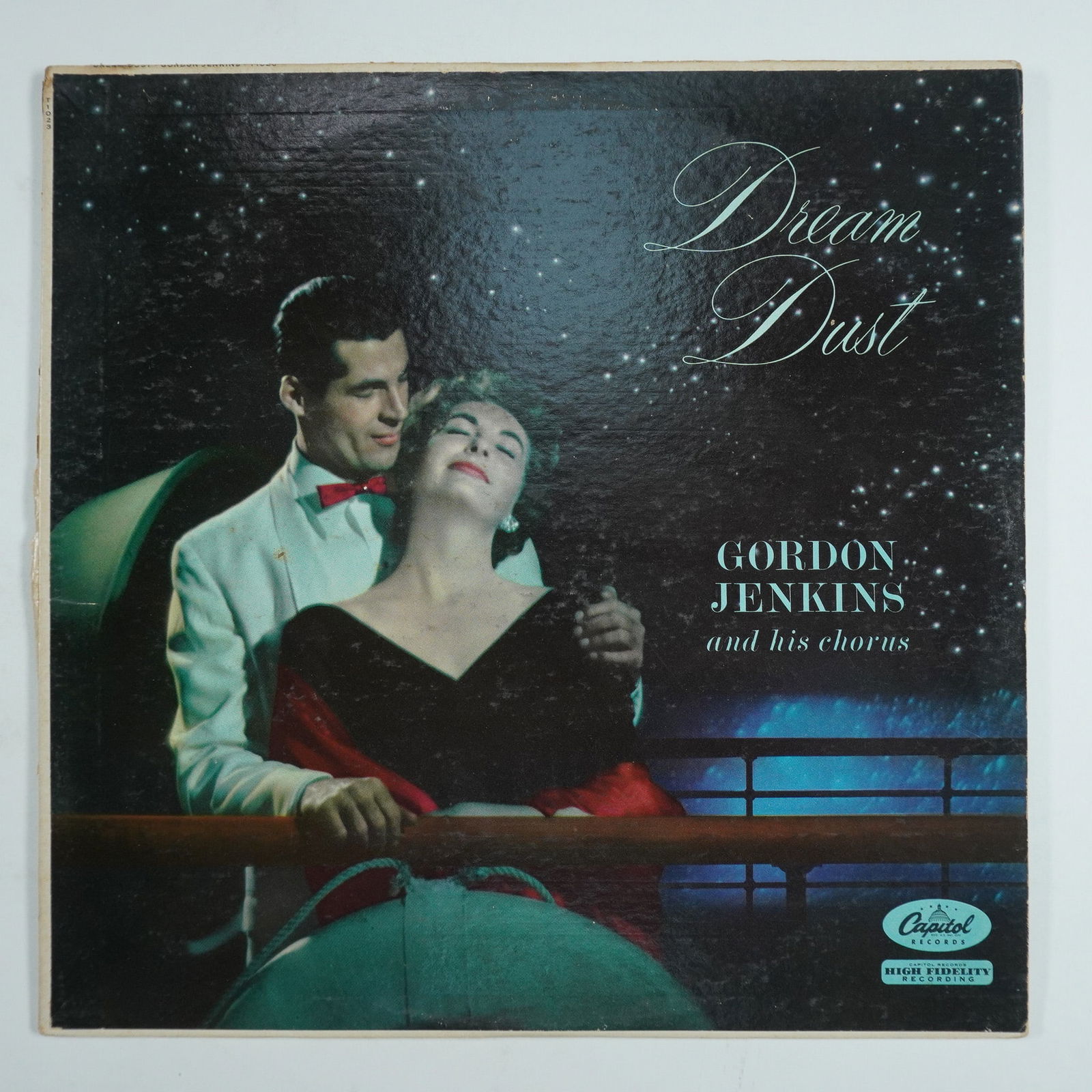 Gordon Jenkins Vinyl Record, Dream Dust: The album showcases a mix of jazz, Latin, and pop influences, offering a smooth and easy listening experience. Known for its lush orchestration and emotive vocal harmonies, this record is a prime exam