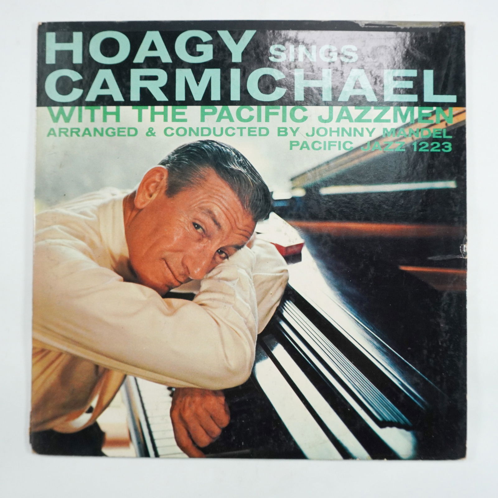 Hoagy Carmichael Hoagy Sings Carmichael Vinyl Record: Pacific Jazz Records, 1956. Hoagy Sings Carmichael features Hoagy Carmichael performing some of his most iconic compositions, arranged and conducted by Johnny Mandel. Accompanied by notable jazz music