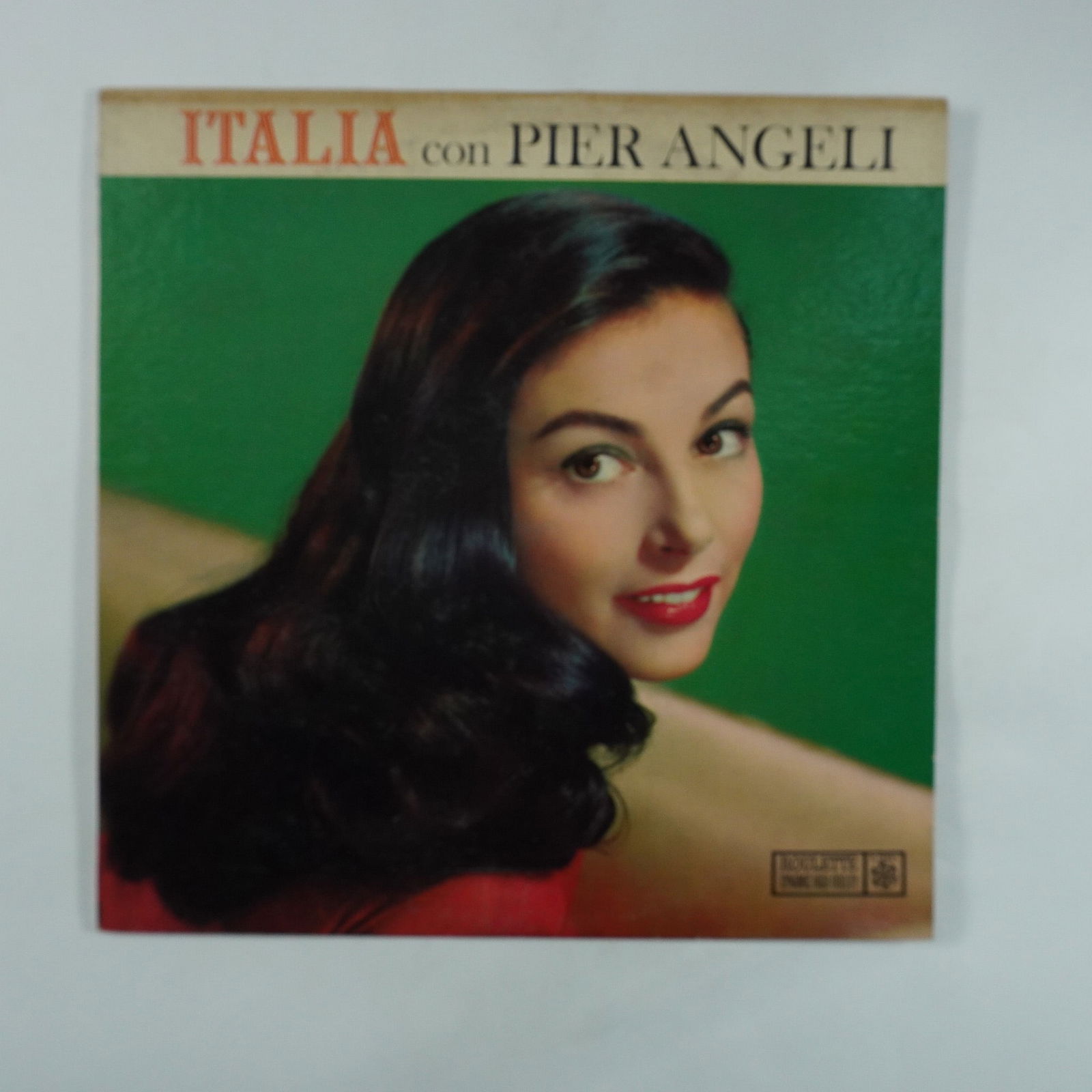 Italia con Pier Angeli Vinyl Record, Roulette Records: Vintage vinyl record titled Italia con Pier Angeli, released by Roulette Records. This album features Pier Angeli, a celebrated Italian actress, in a collection of Italian songs. The label displays a
