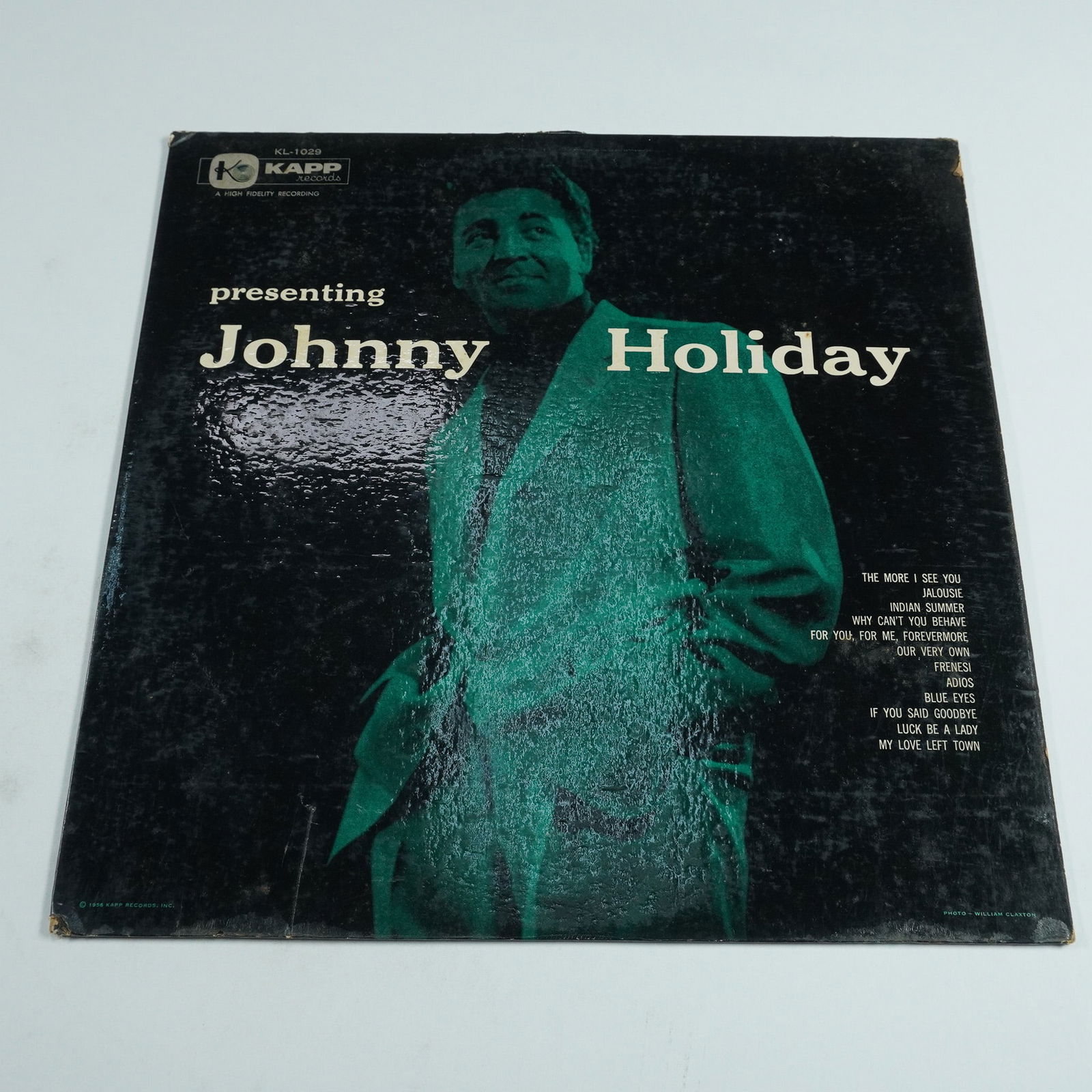 Kapp Records Vinyl Record Presenting Johnny Holiday: Vintage vinyl record 'Presenting Johnny Holiday' by jazz vocalist Johnny Holiday, released by Kapp Records. This album showcases Holiday's rich vocal delivery, blending smooth jazz influences with cla