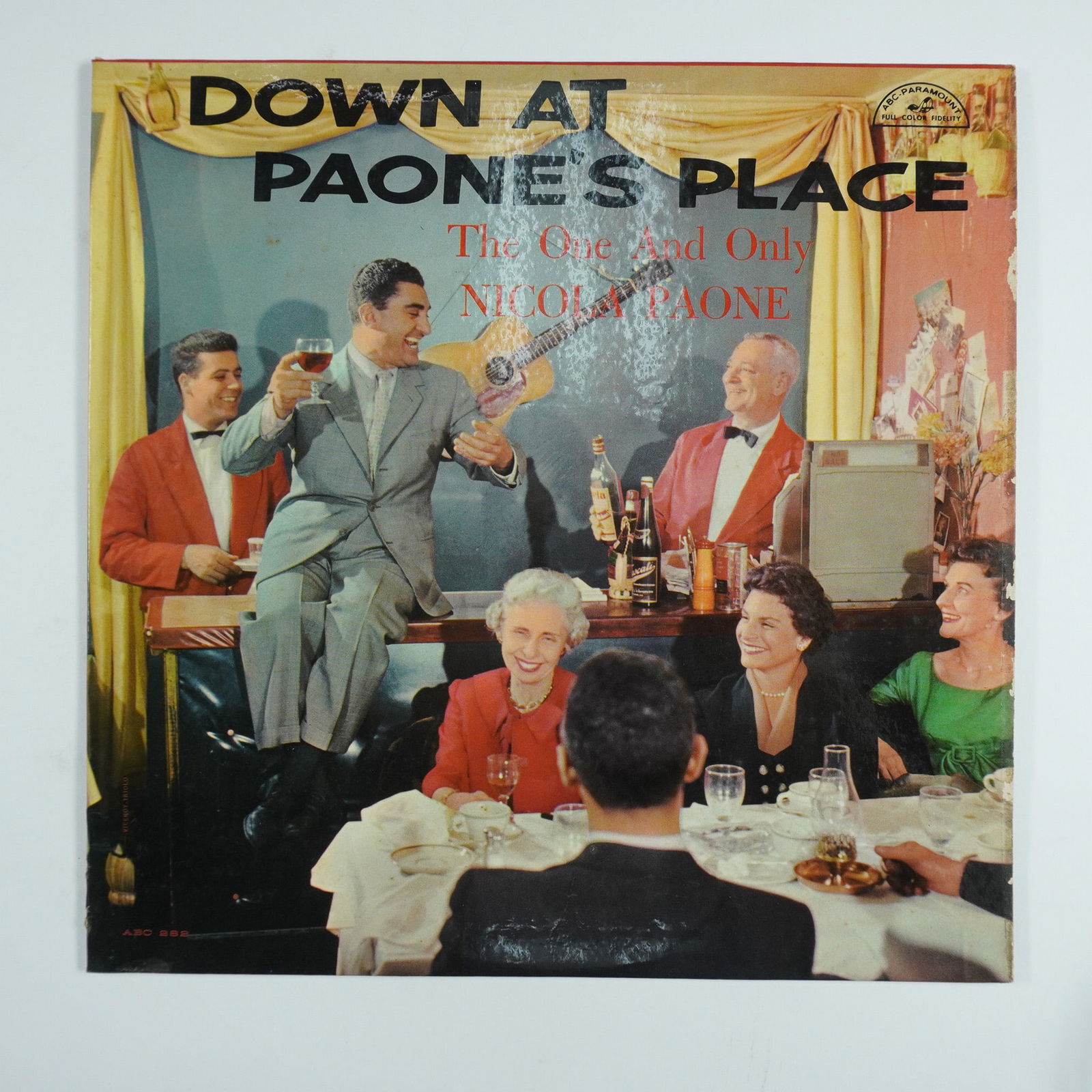 Nicola Paone Down at Paone's Place Vinyl LP Italian-American Folk: Released in the United States, this classic Italian-American folk album Down at Paone's Place by Nicola Paone brings the lively atmosphere of an old-world Italian restaurant to life. Featuring Paone's