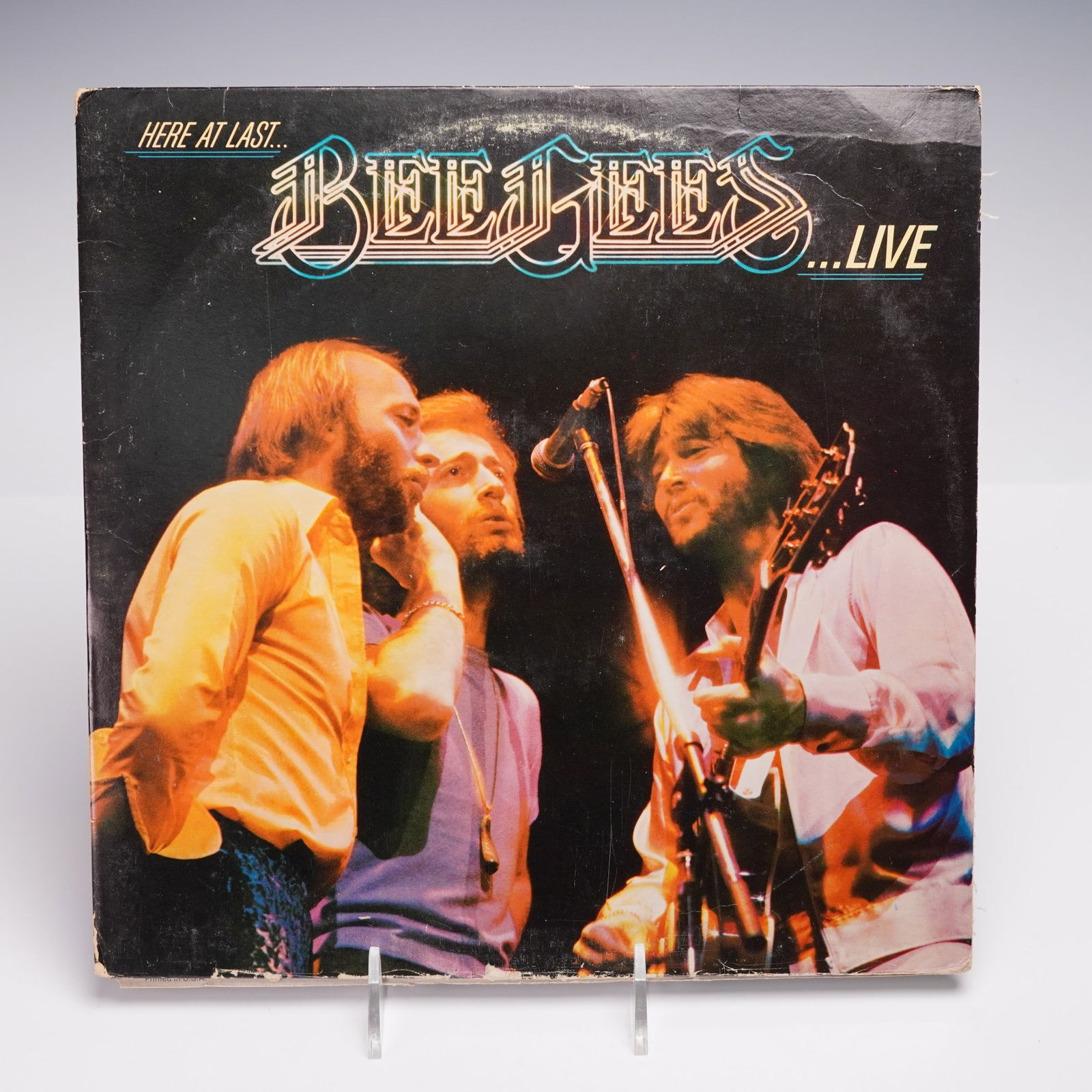 RSO Records Bee Gees 2 Vinyl Records, Here At Last Bee Gees Live: RSO Records 12-inch vinyl record titled Here At Last Bee Gees Live, featuring a live performance by the Bee Gees. Released under RSO Records, this double LP includes a collection of tracks across four