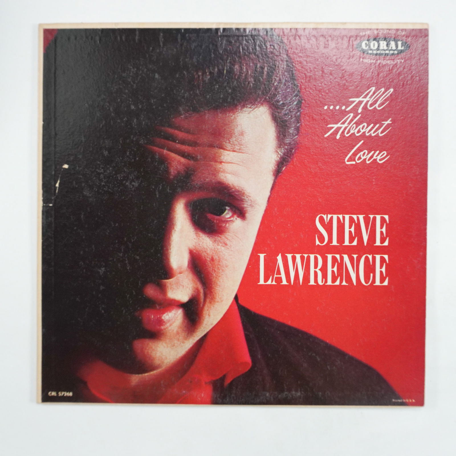 Steve Lawrence, All About Love Vinyl Record: Coral Records release of All About Love by Steve Lawrence, featuring orchestral direction by Nick Perito. This vintage vinyl record includes classic romantic tracks such as More Than You Know, When I